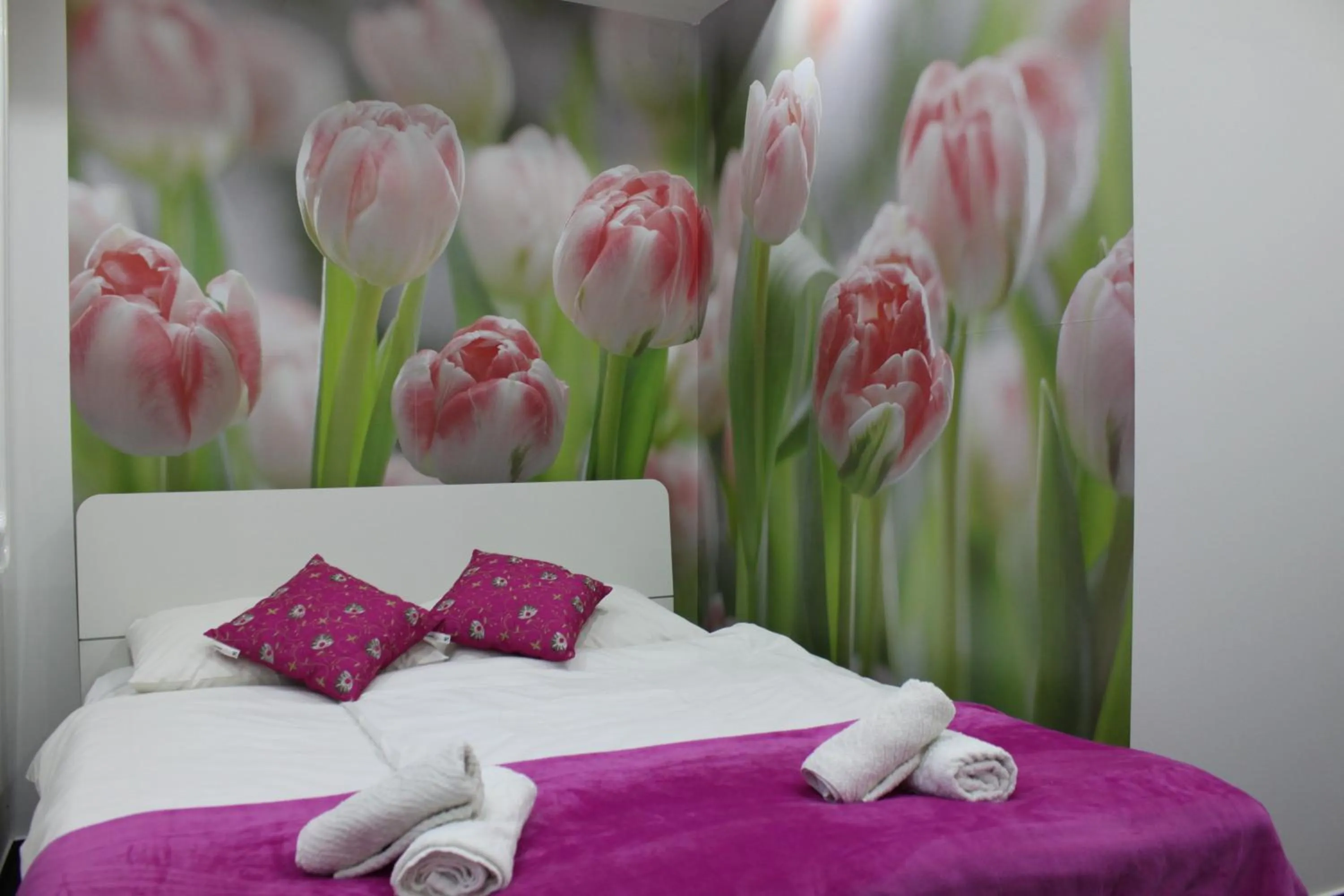 Bed in Luwiana Suites