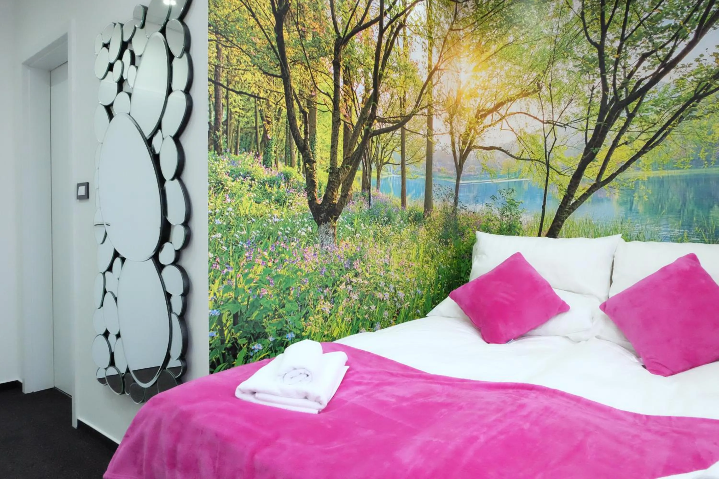 Bed in Luwiana Suites