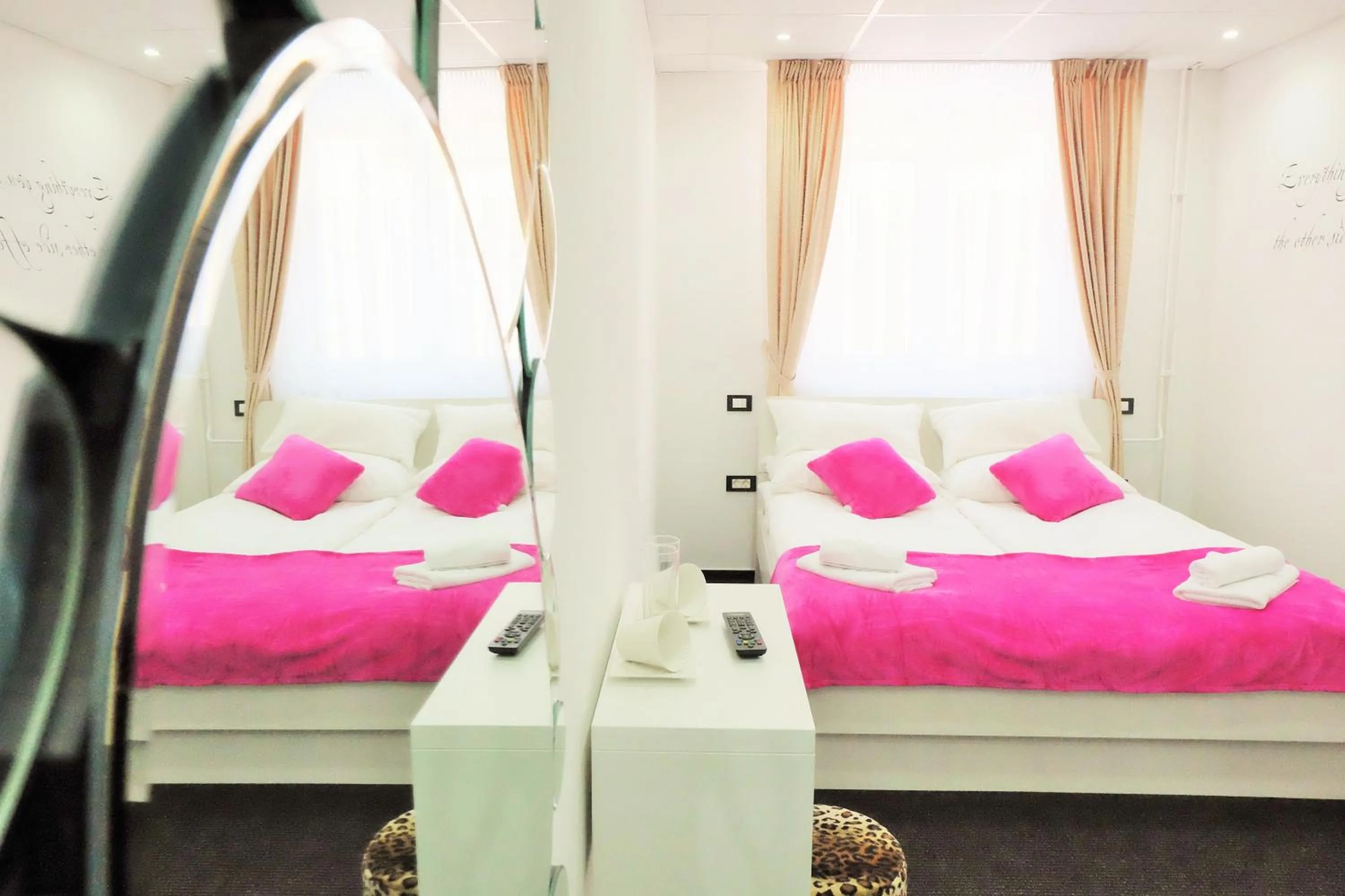 Bed in Luwiana Suites