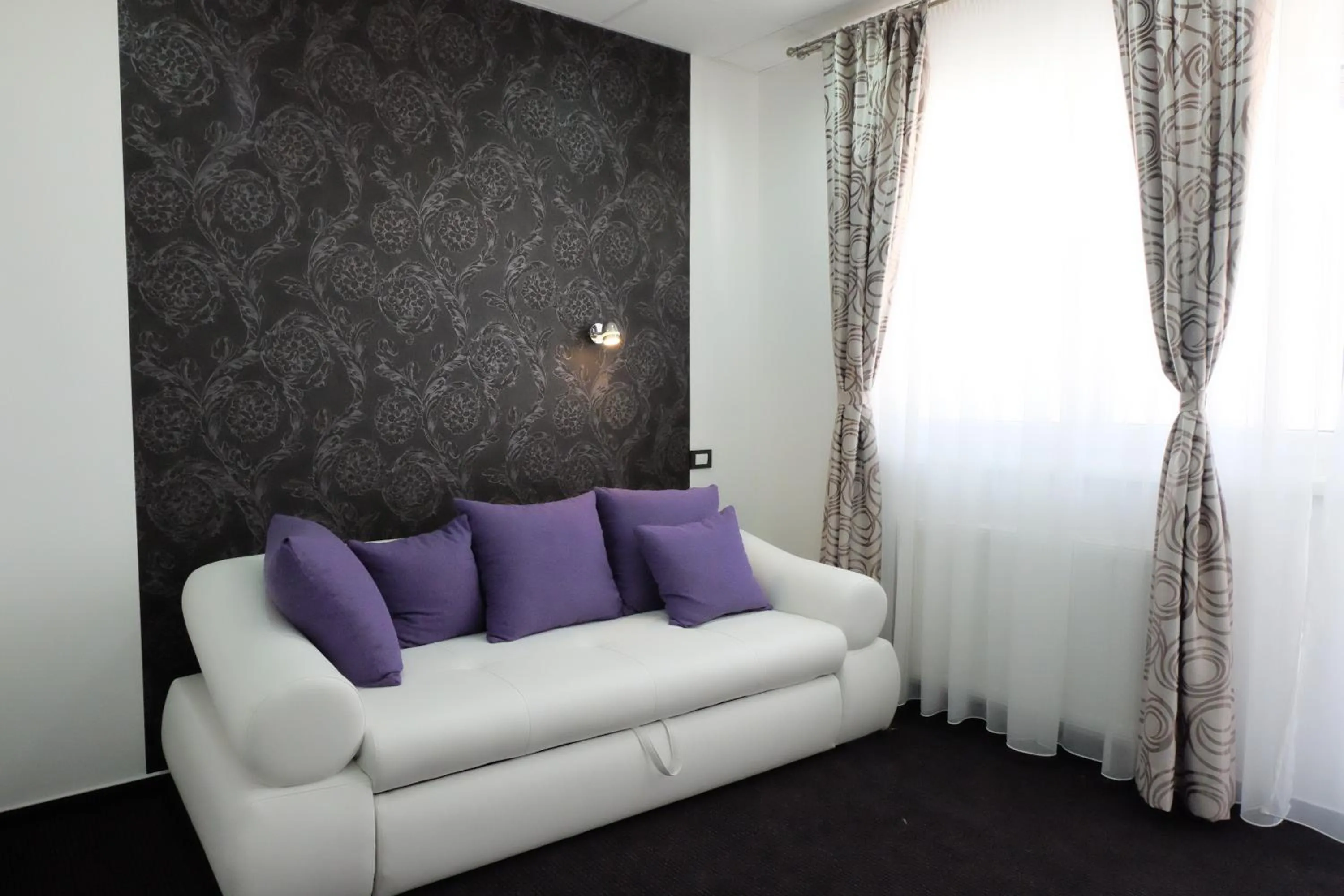 Living room in Luwiana Suites