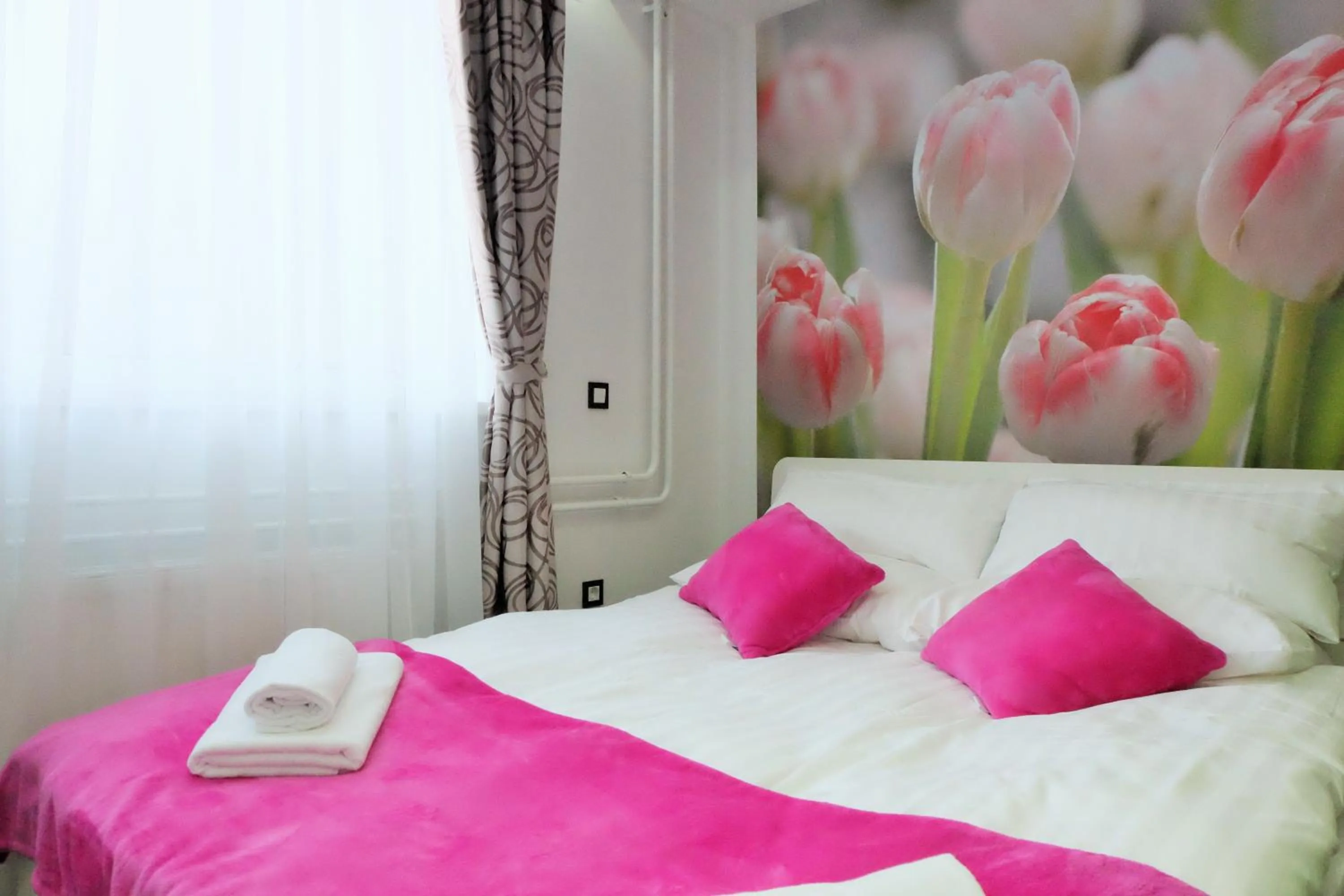 Bed in Luwiana Suites