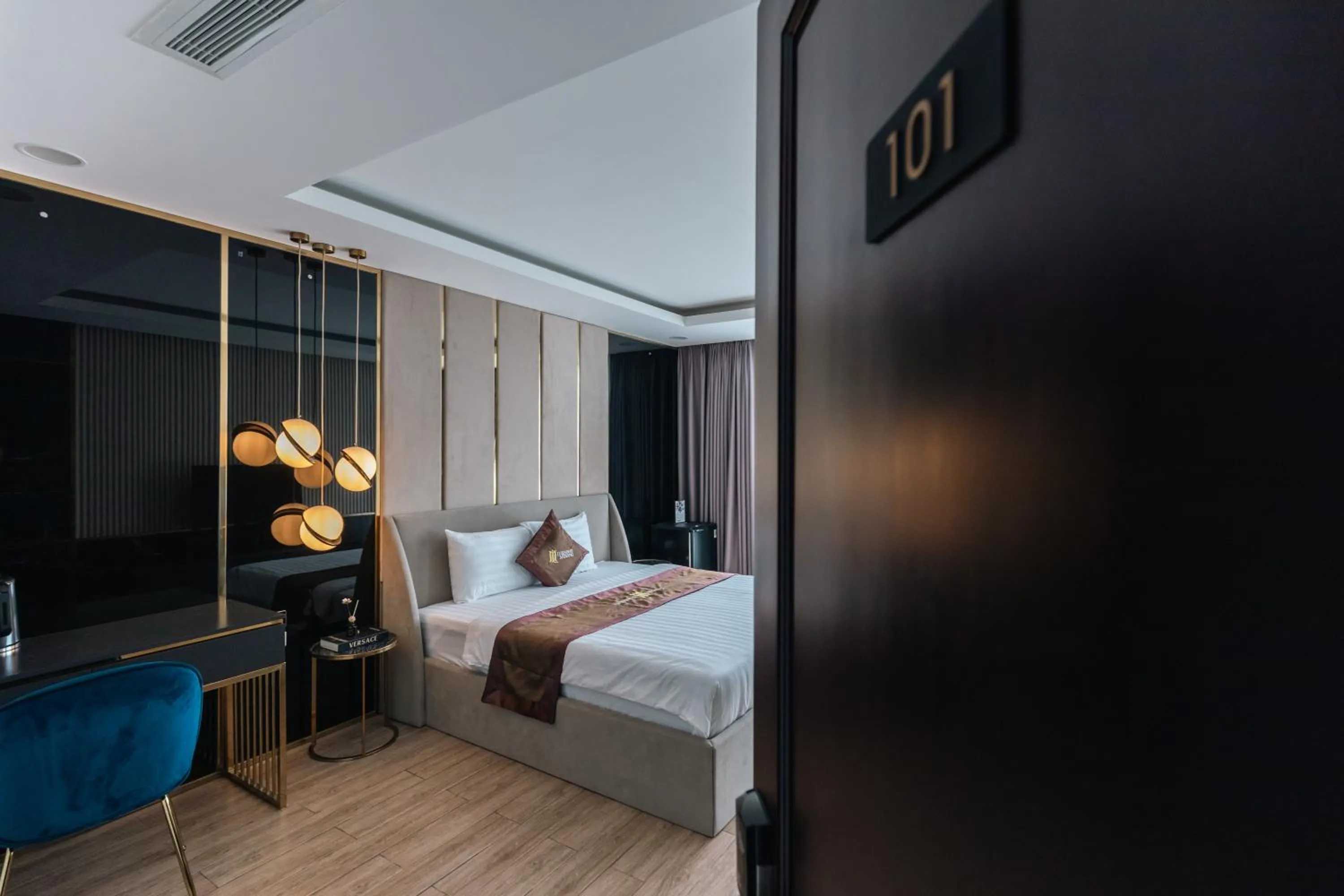 Bed in Luxhome Mekong Hotel