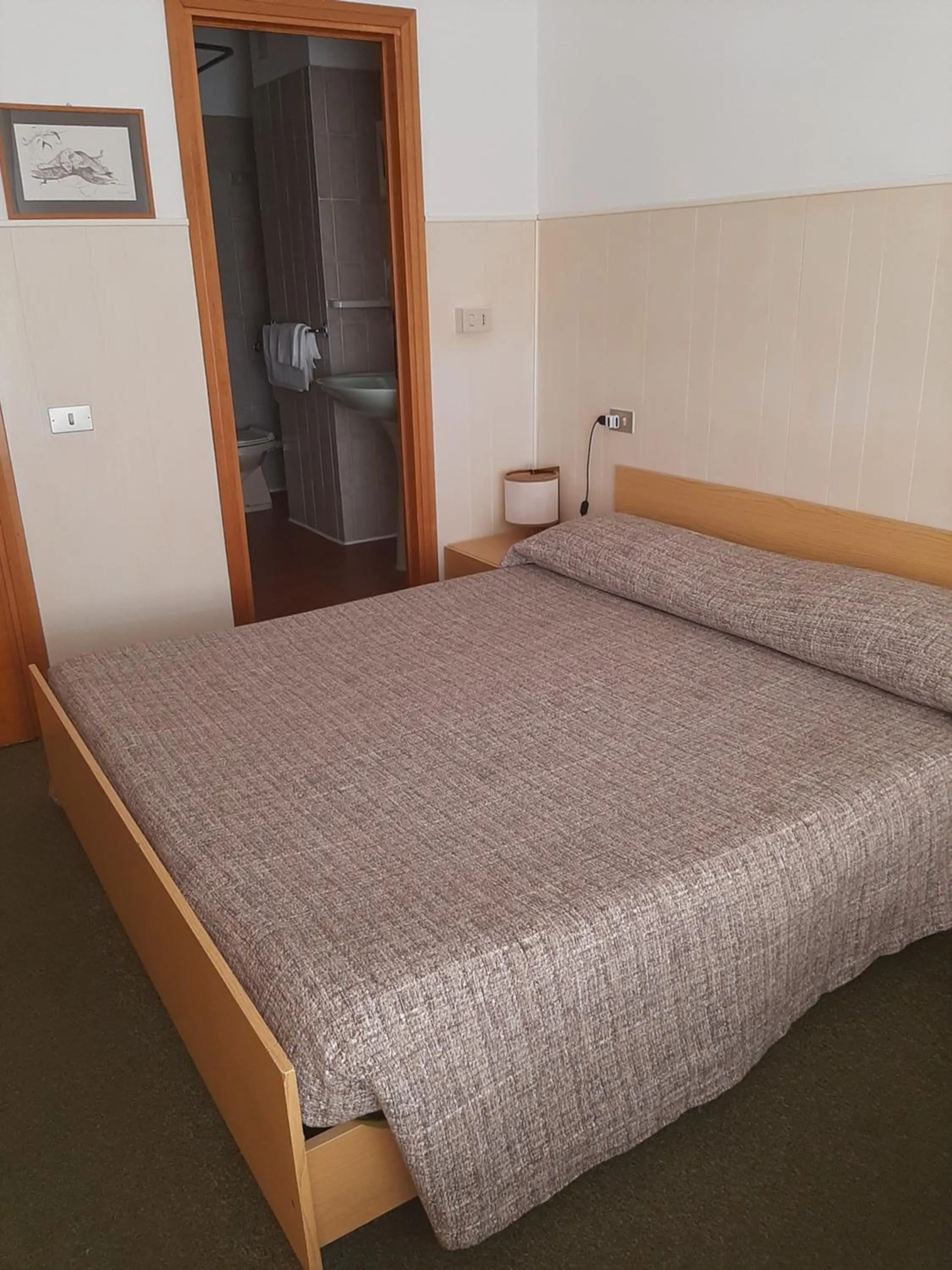 Bed in Hotel Cucciolo