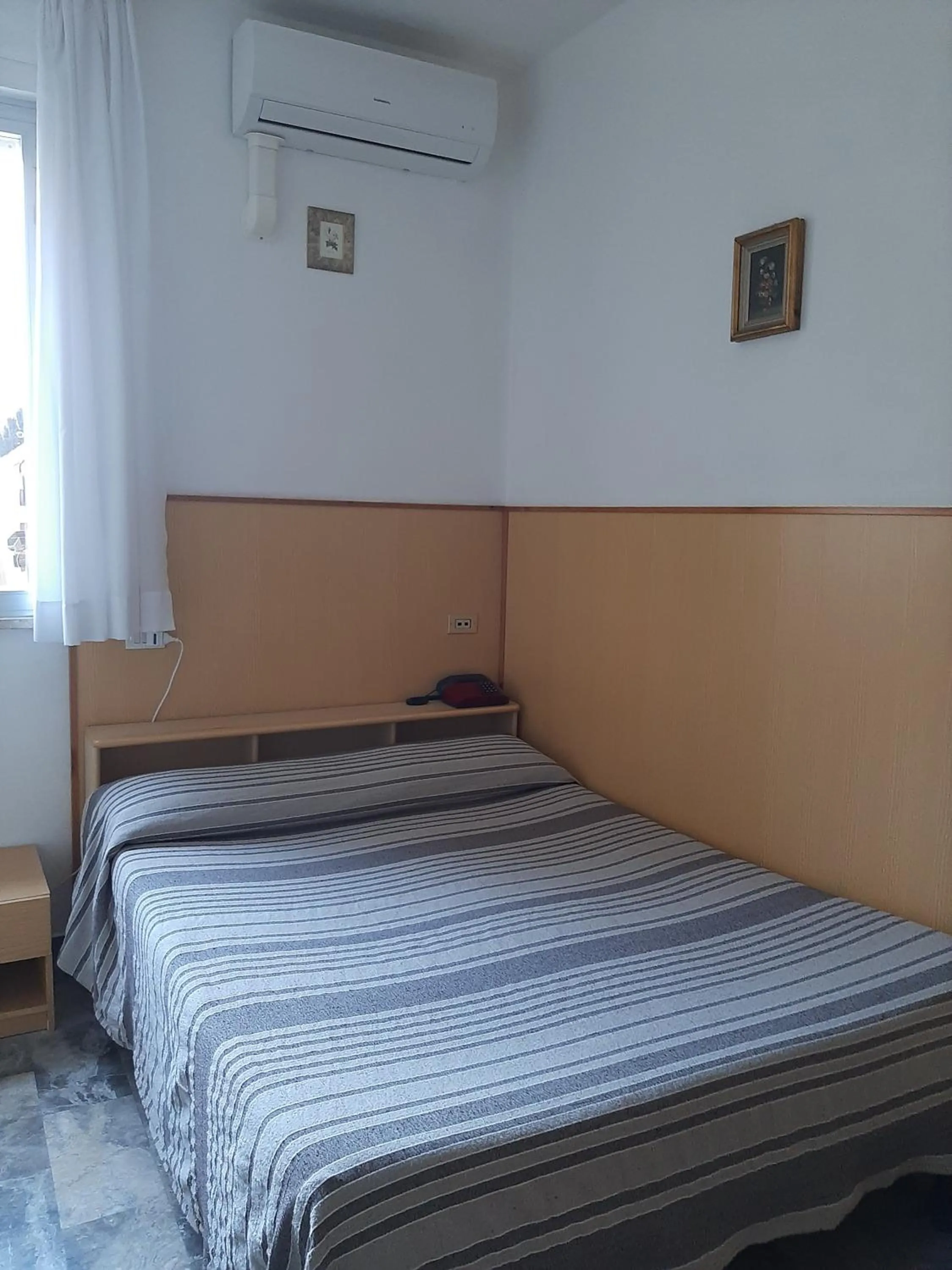 Bed in Hotel Cucciolo