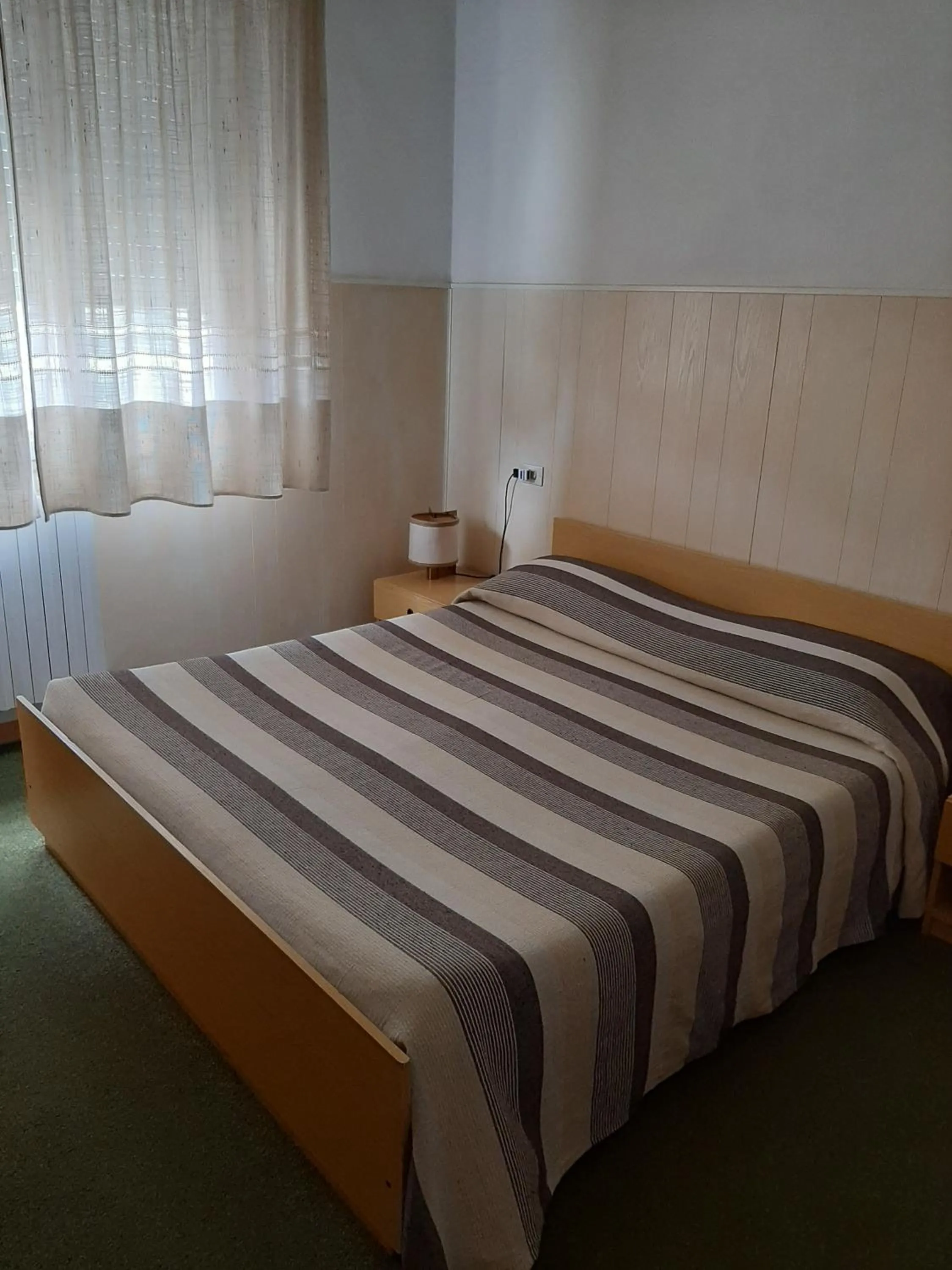 Bed in Hotel Cucciolo