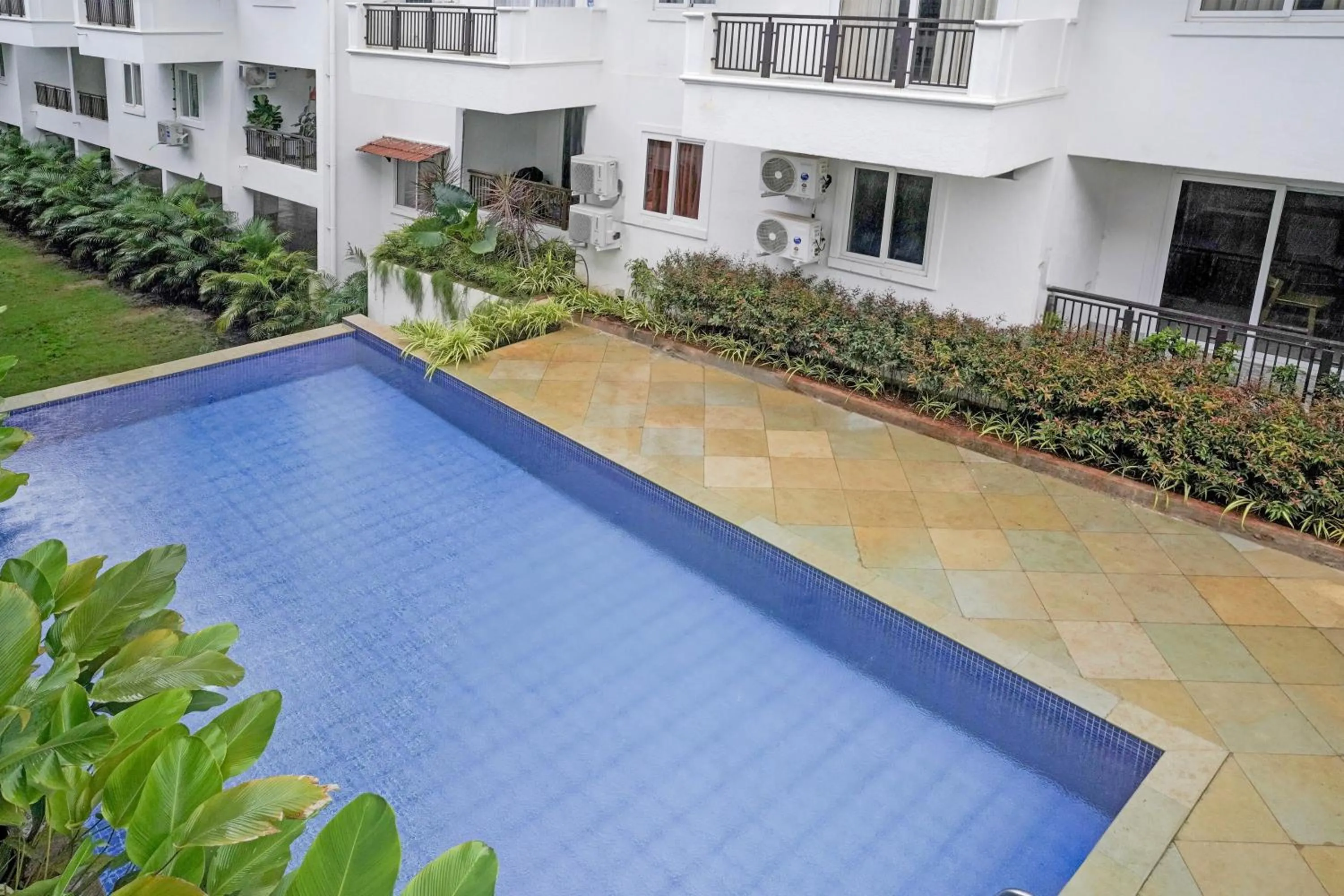 Swimming pool in Naavinya by DanCenter - 1BHK apartment in Siolim