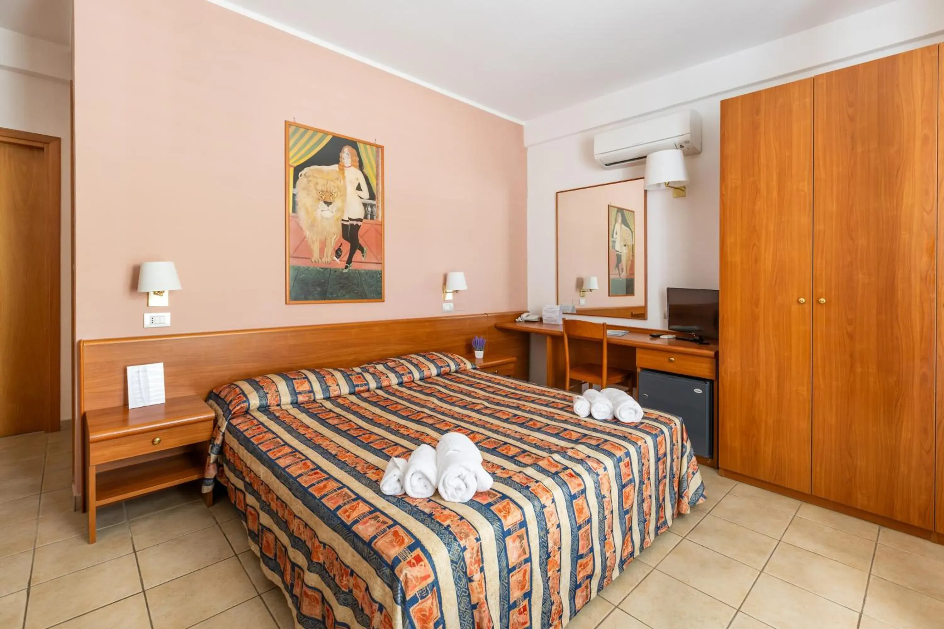 Triple Room in Hotel Palme Gemelle Triple Room in Hotel Palme Gemelle