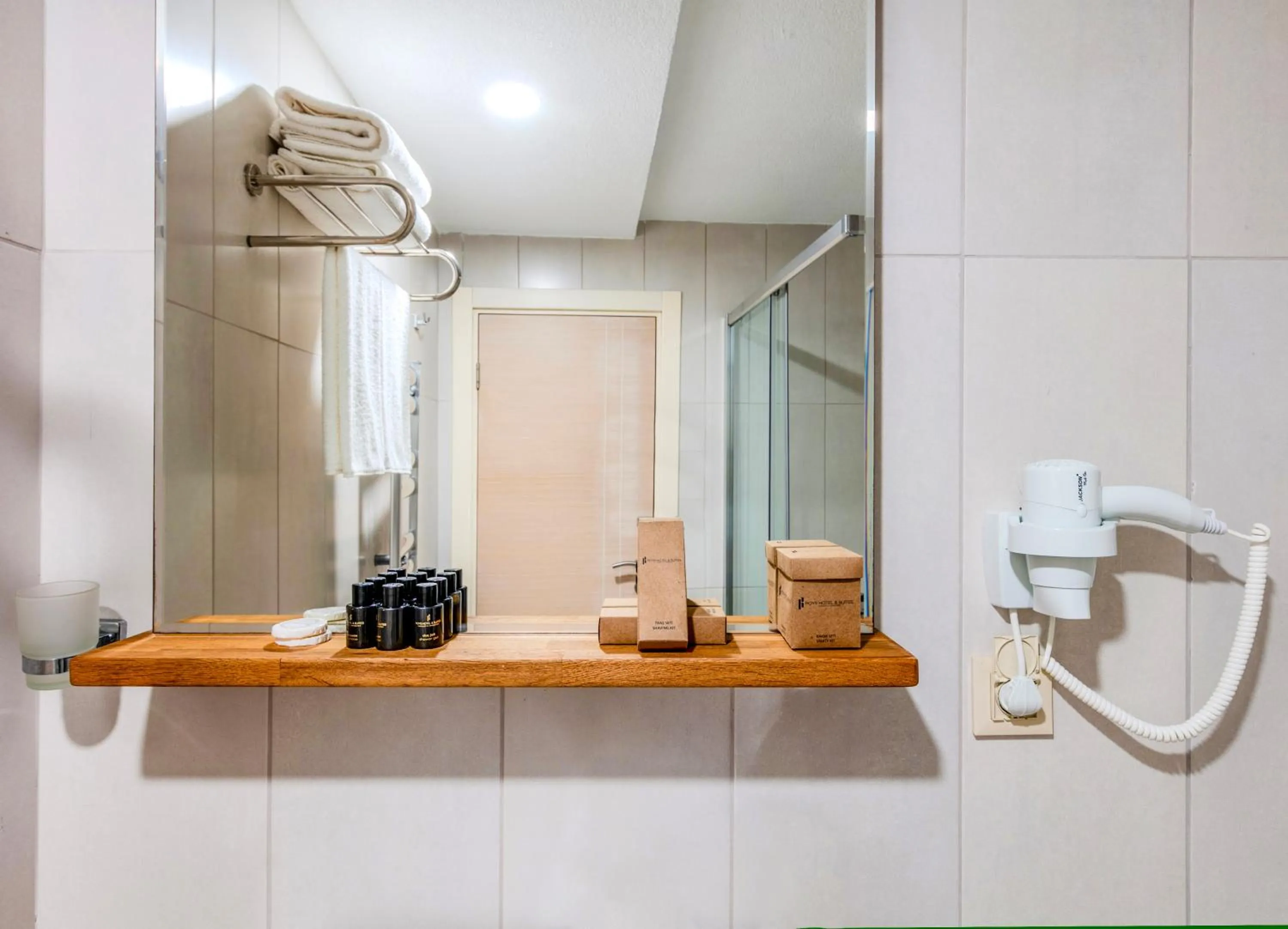 Bathroom in Roys Hotel & Suites