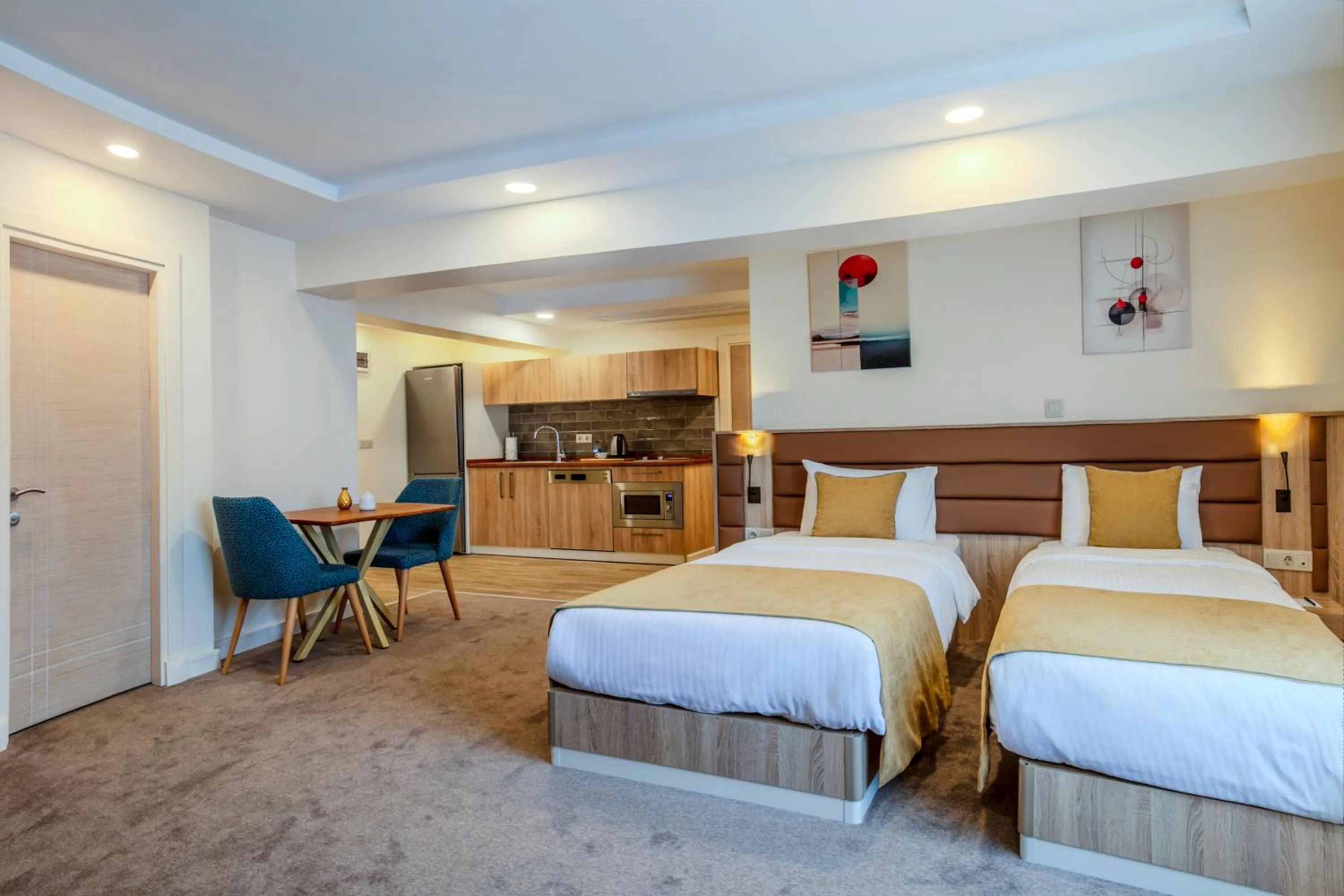 Bed in Roys Hotel & Suites