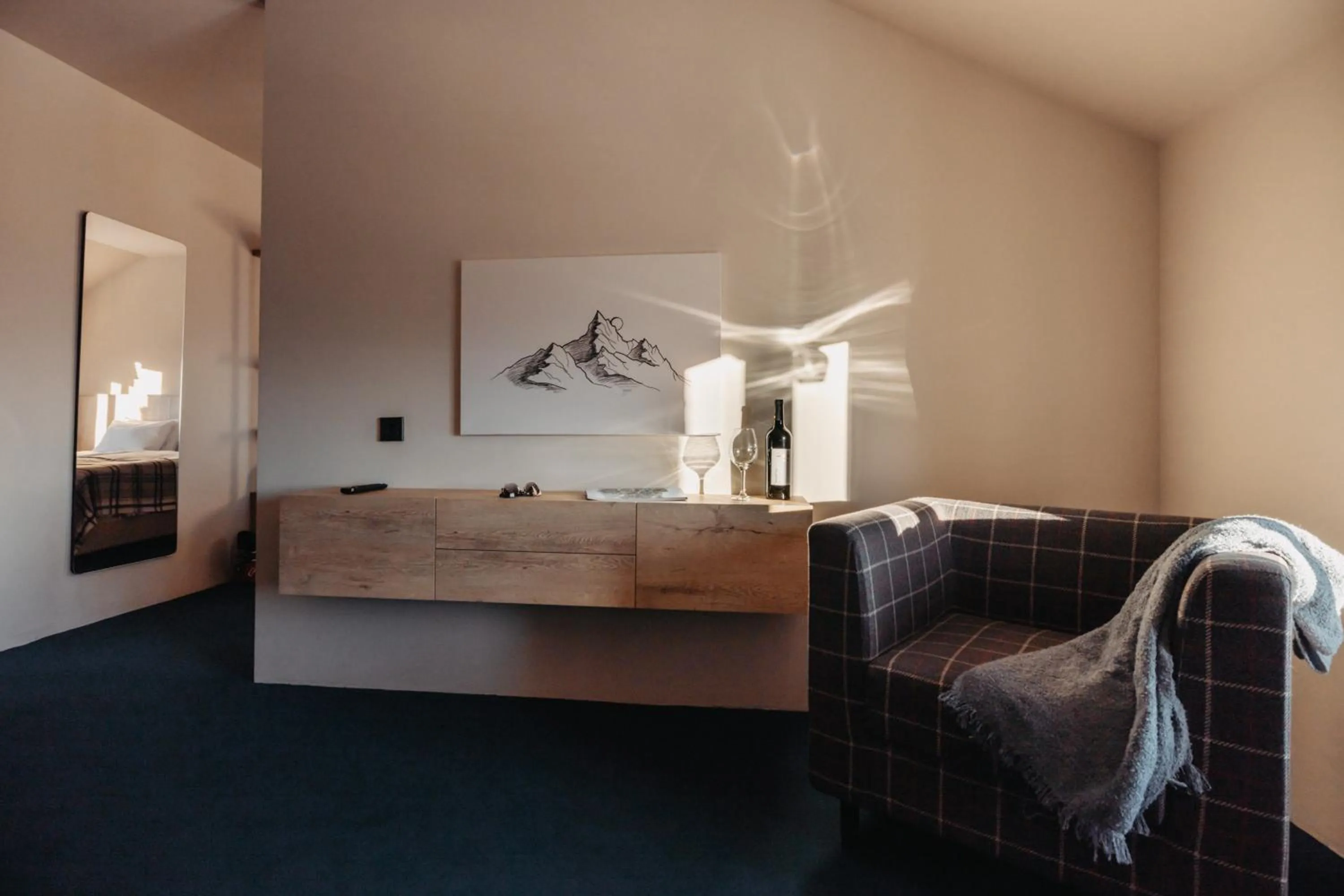 Living room, Bed in Alpina Hotel Gudauri