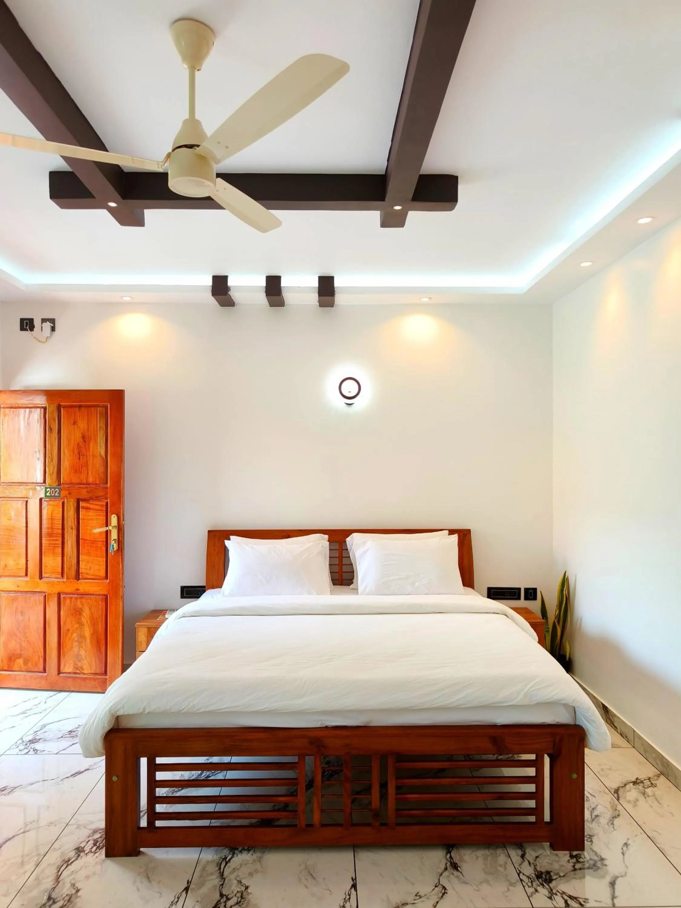 Bed in Wavealokam Beach Retreat