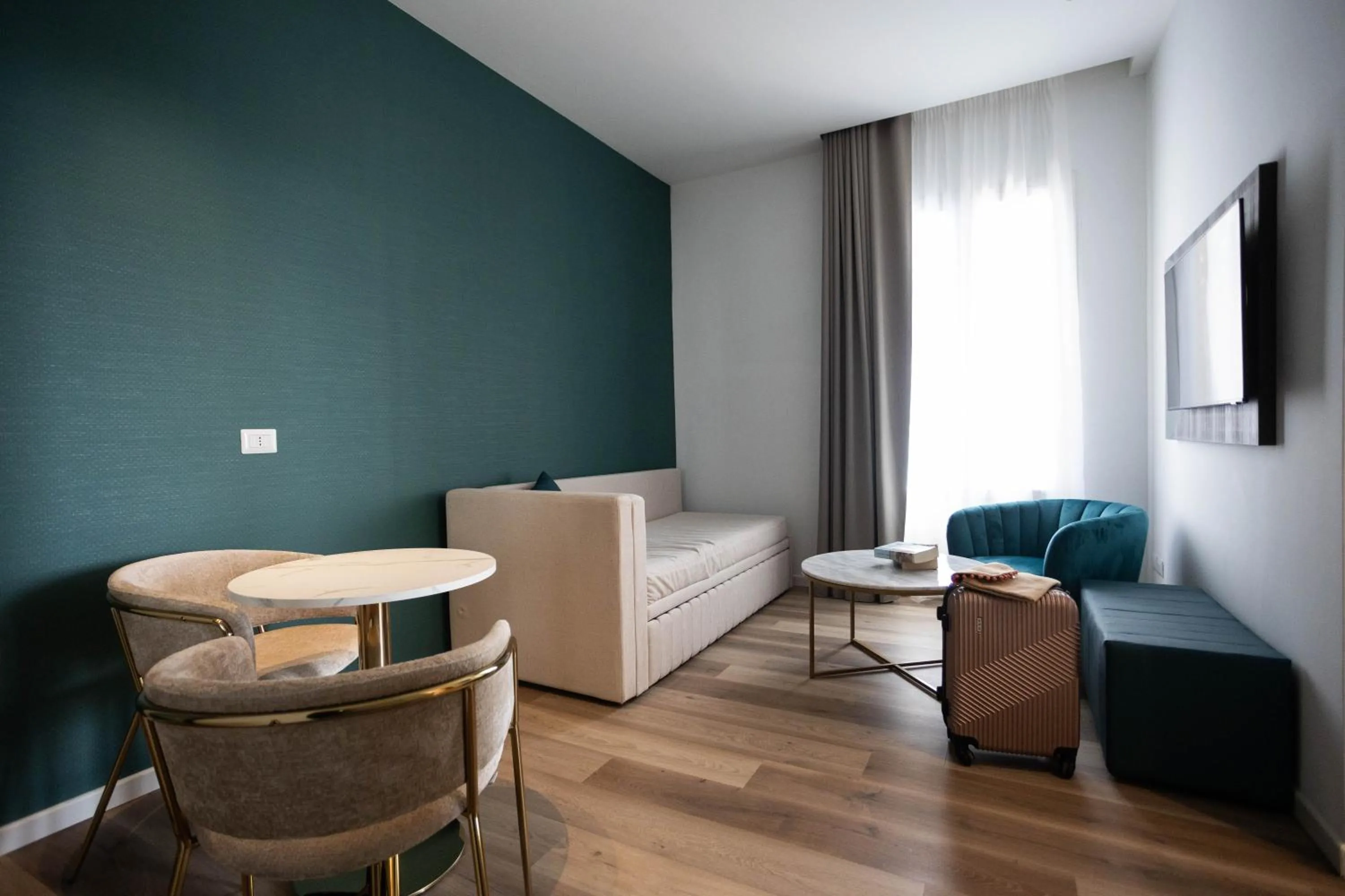 Communal lounge/ TV room in Mondello Glam Hotel & Terrace