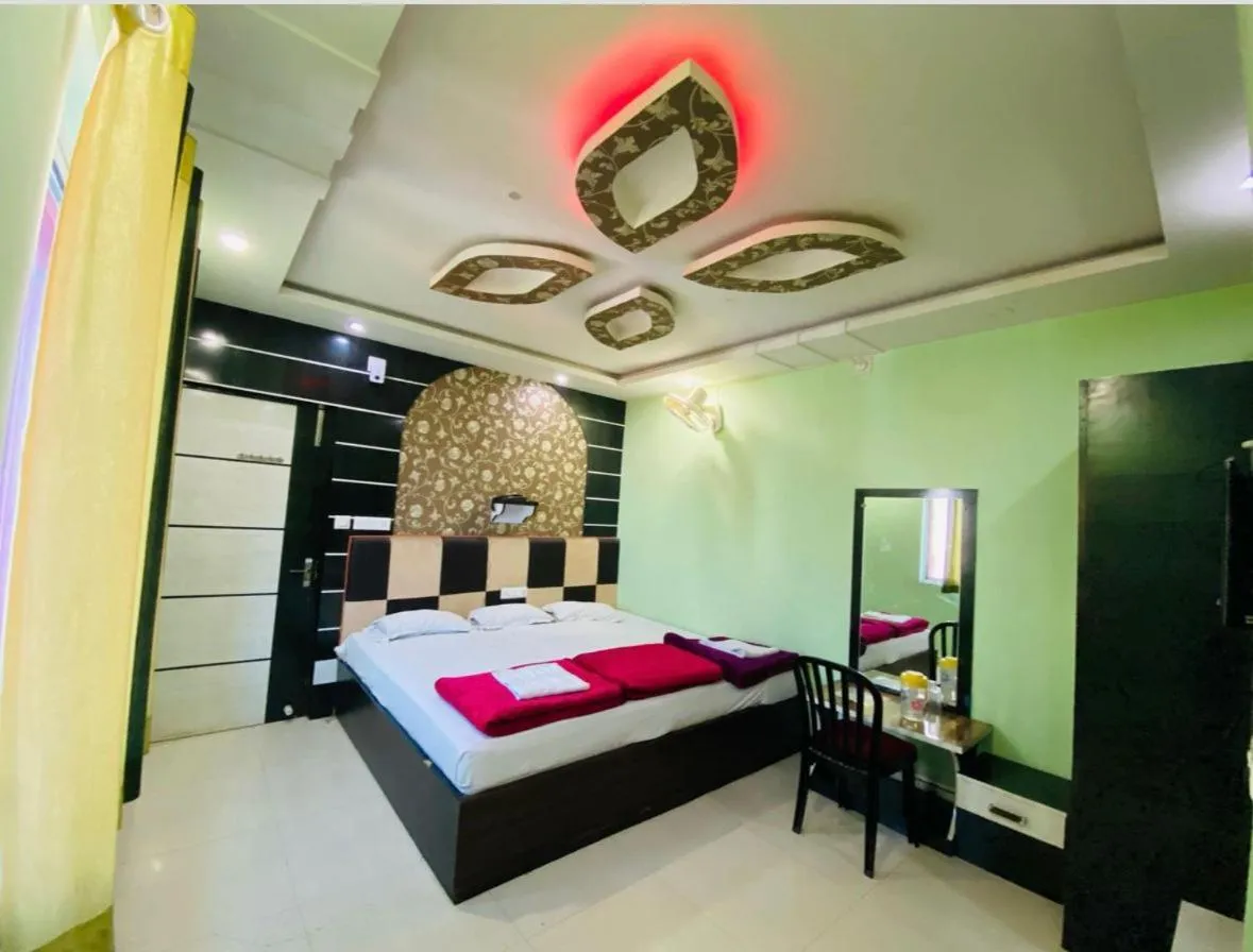 Bed in Hotel Basant Vihar International
