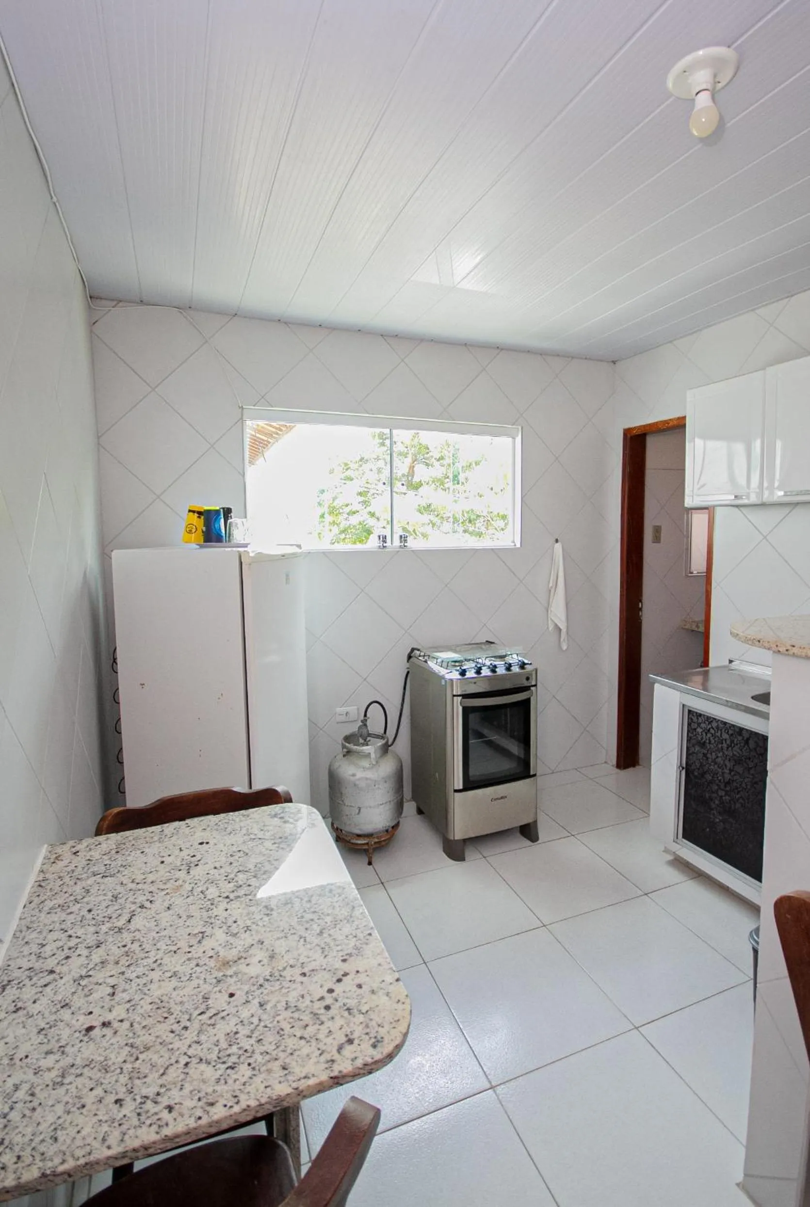 Kitchen or kitchenette in Pousada Santa Fé