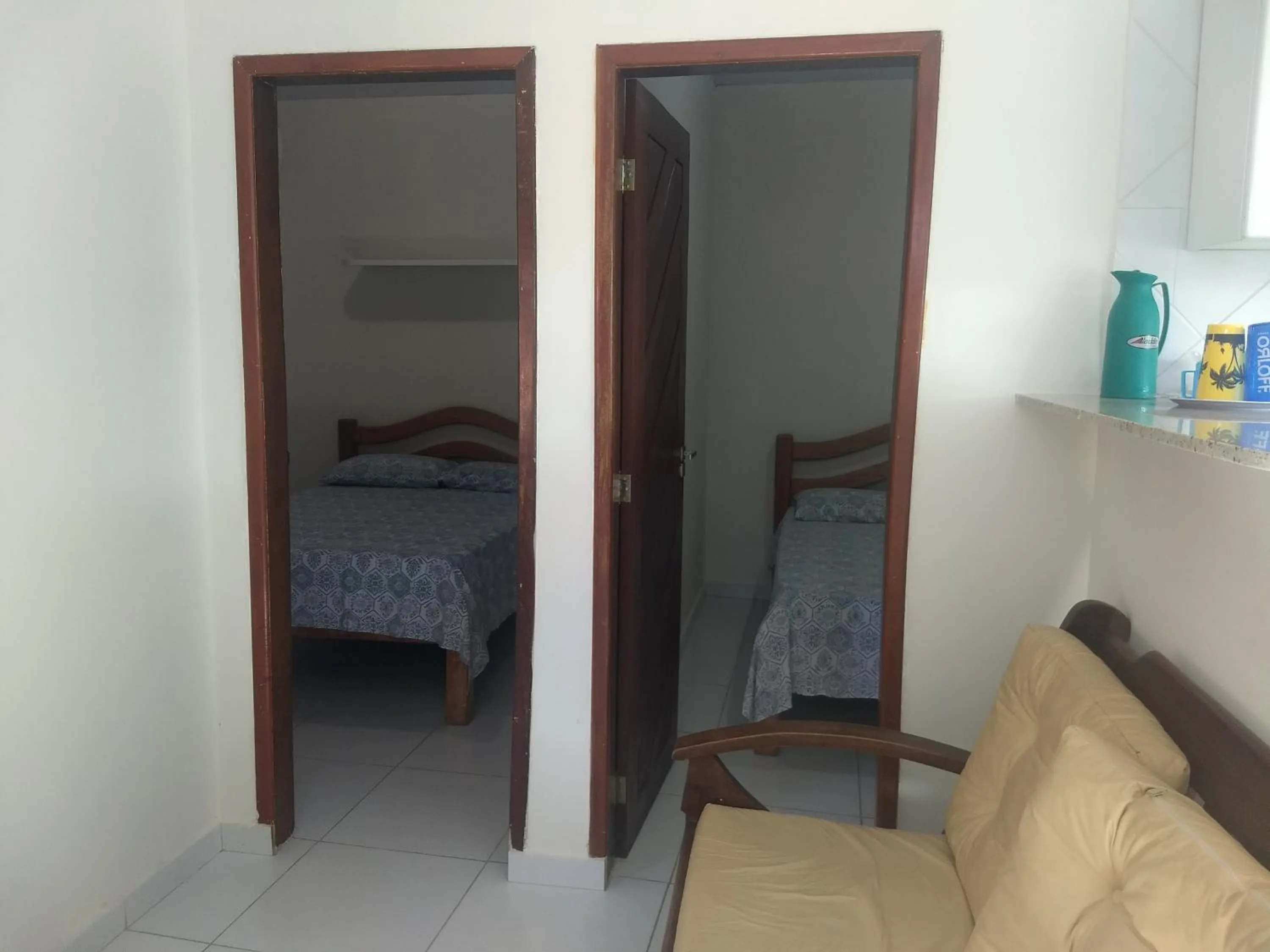 Living room, Bed in Pousada Santa Fé