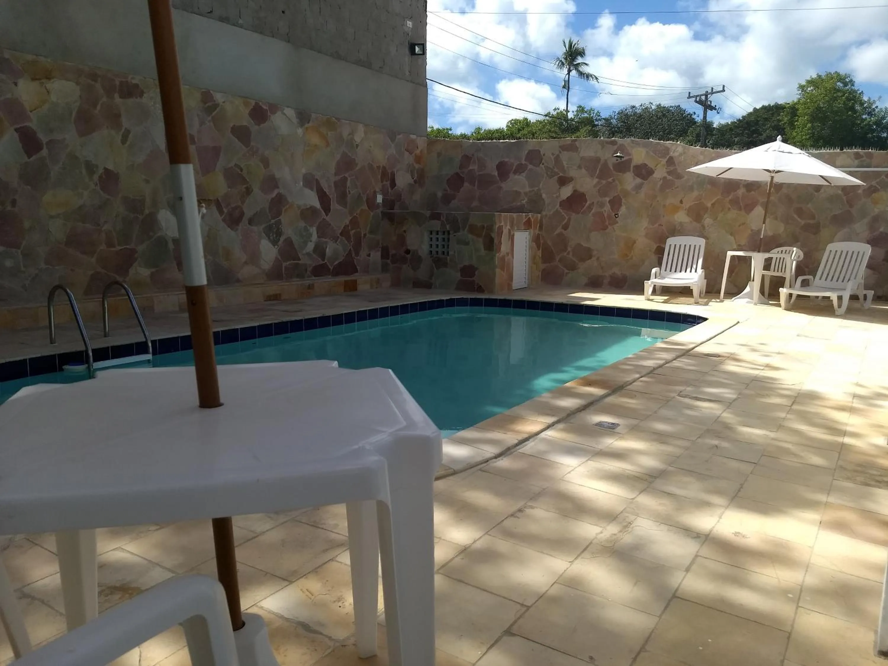 Swimming pool in Pousada Santa Fé