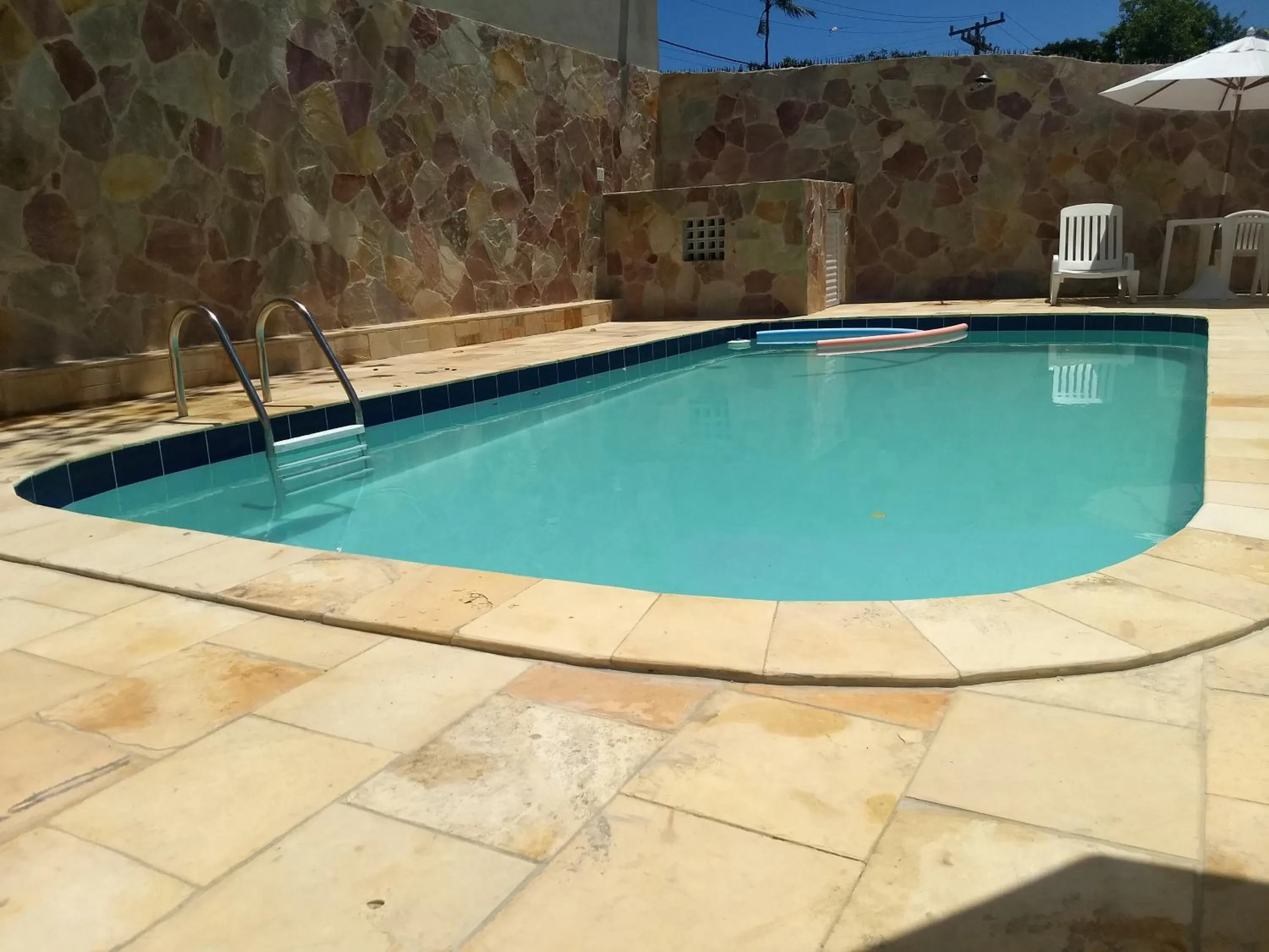 Swimming pool in Pousada Santa Fé