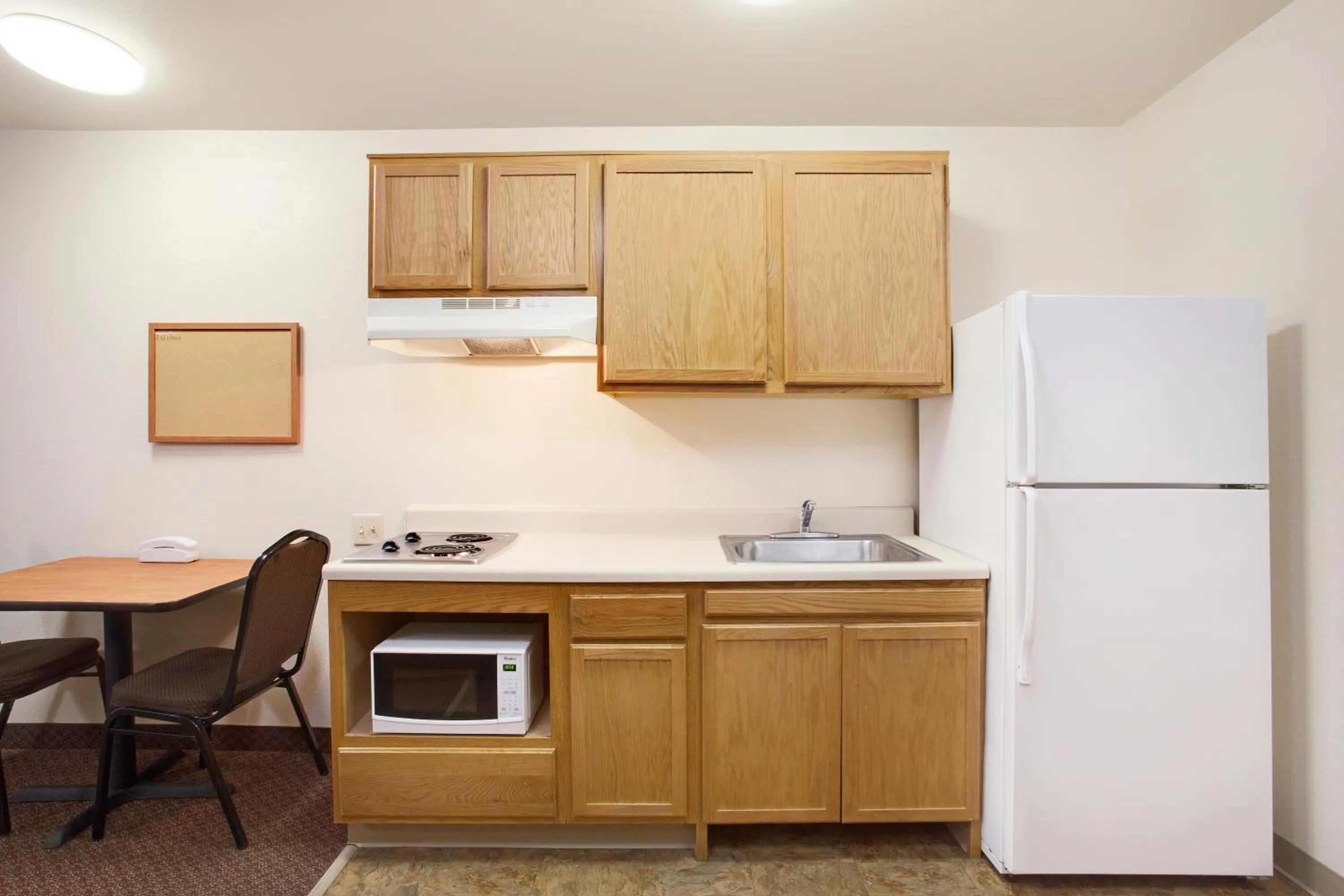 Kitchen or kitchenette in WoodSpring Suites Odessa