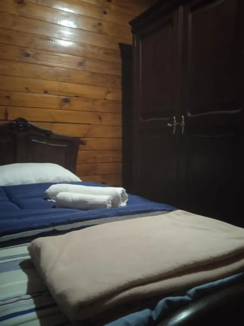 Bed in Pousada Chale Pico da Bandeira