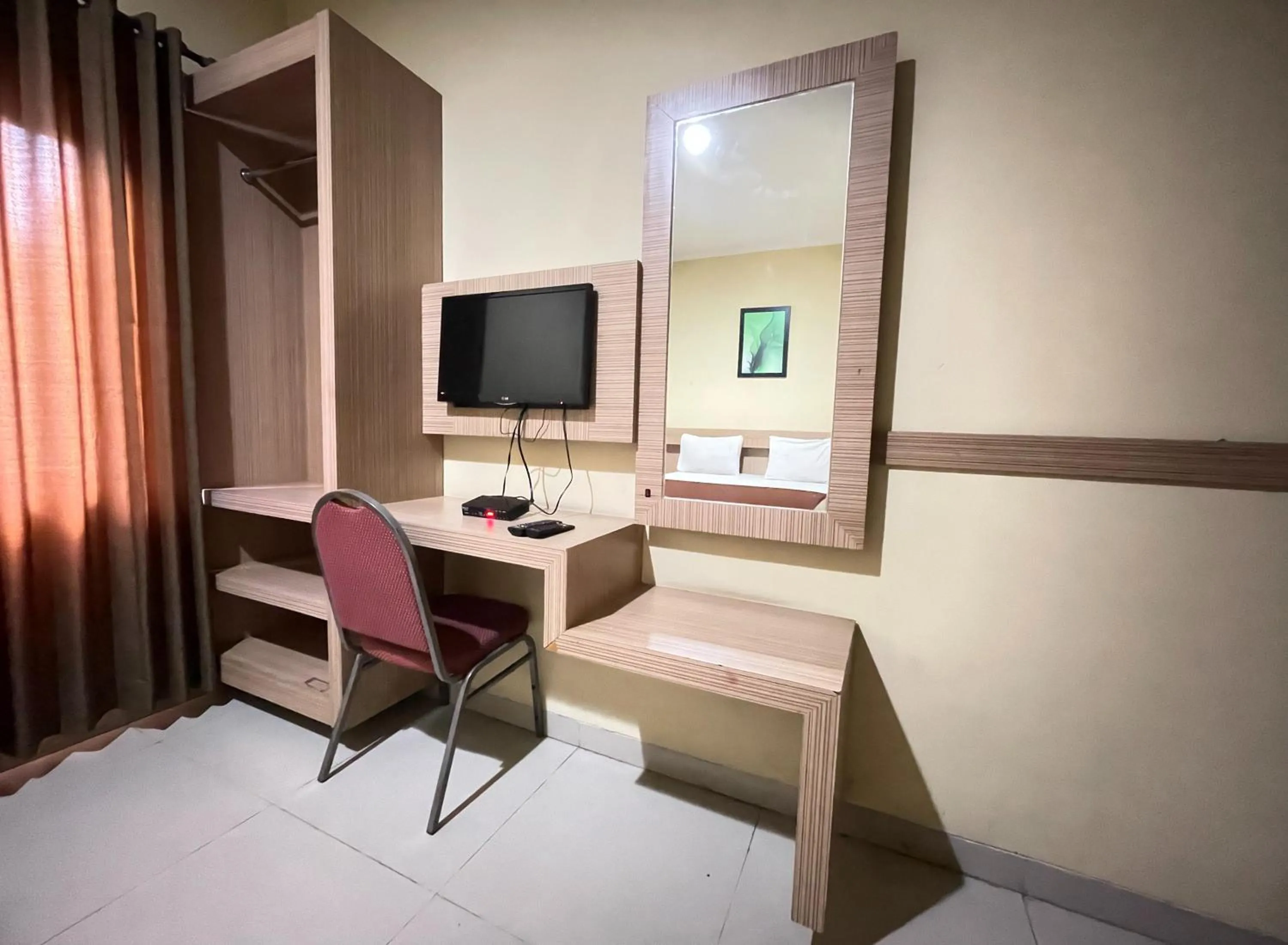 TV and multimedia in Hotel Cemara Hijau