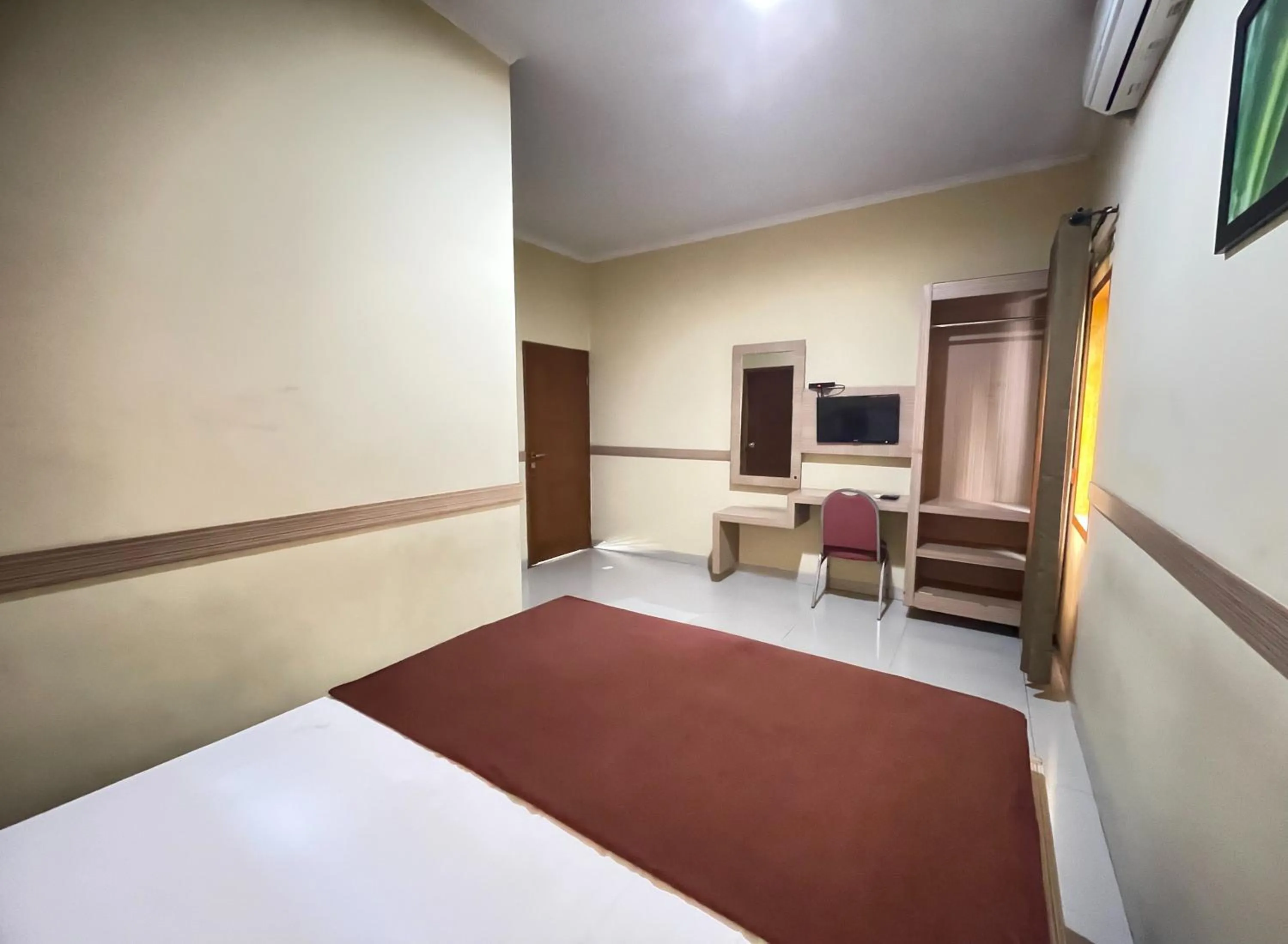 Bed in Hotel Cemara Hijau