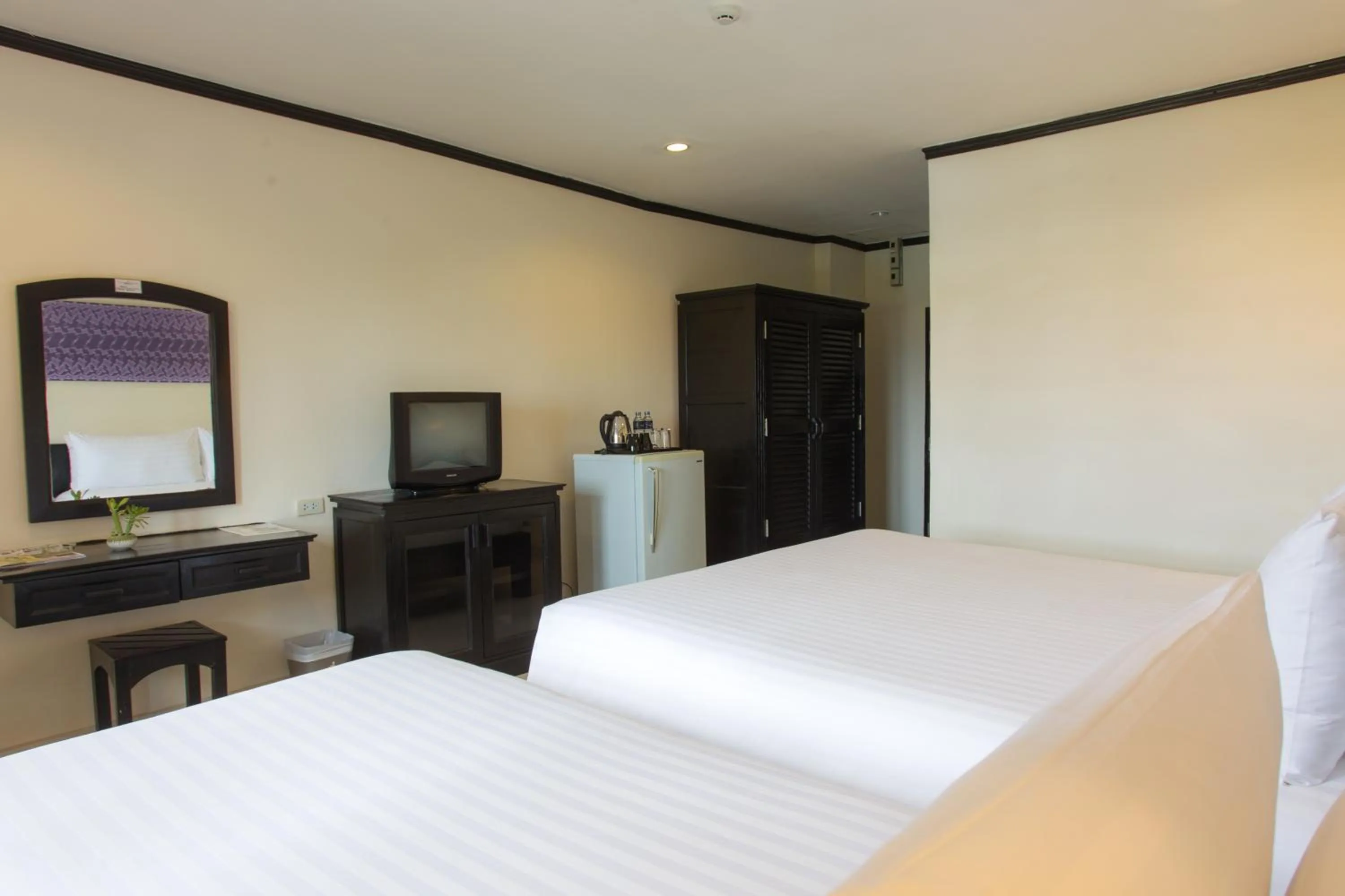 Bedroom in Golden Tulip Essential Pattaya