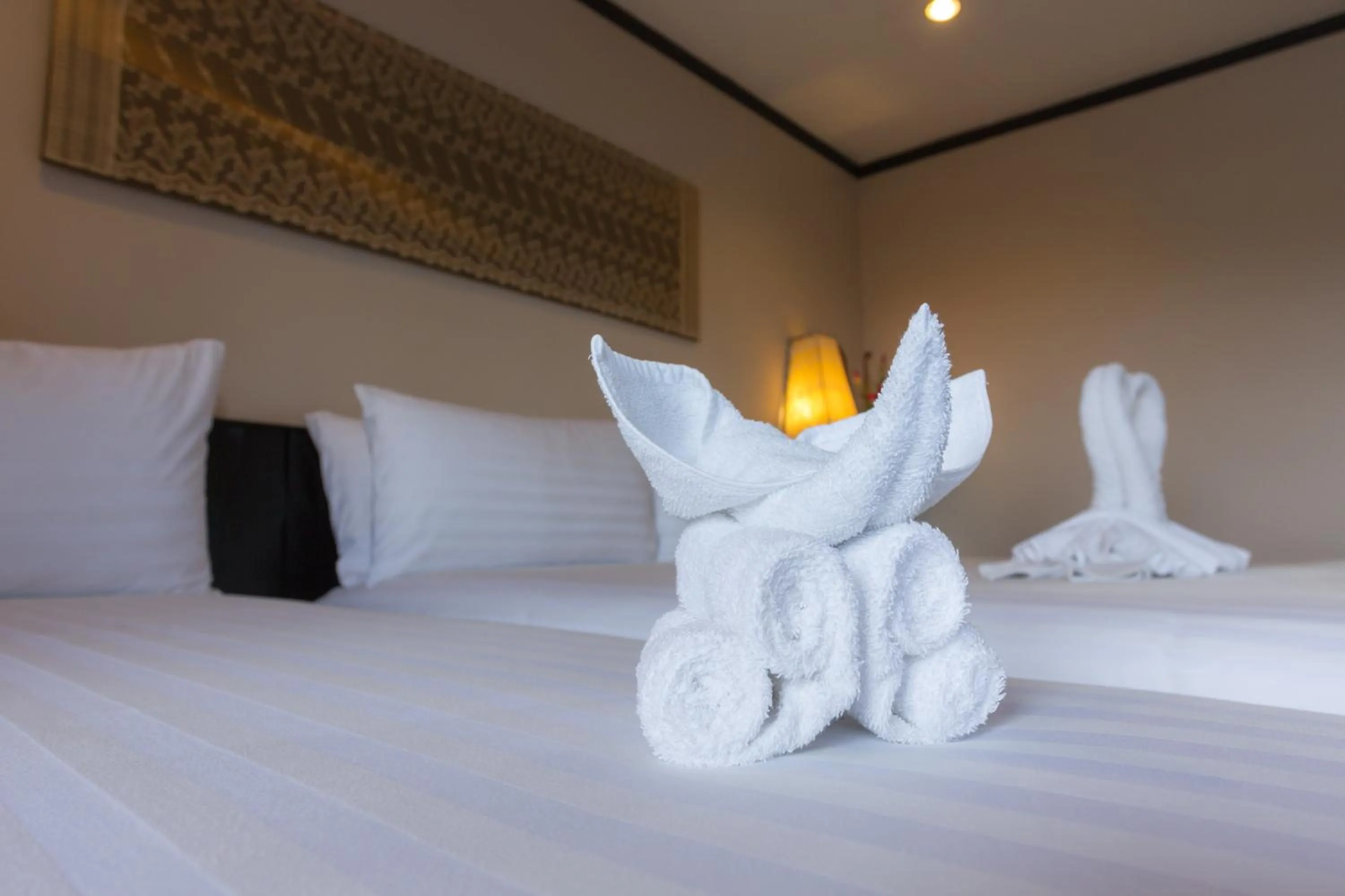 Bedroom in Golden Tulip Essential Pattaya