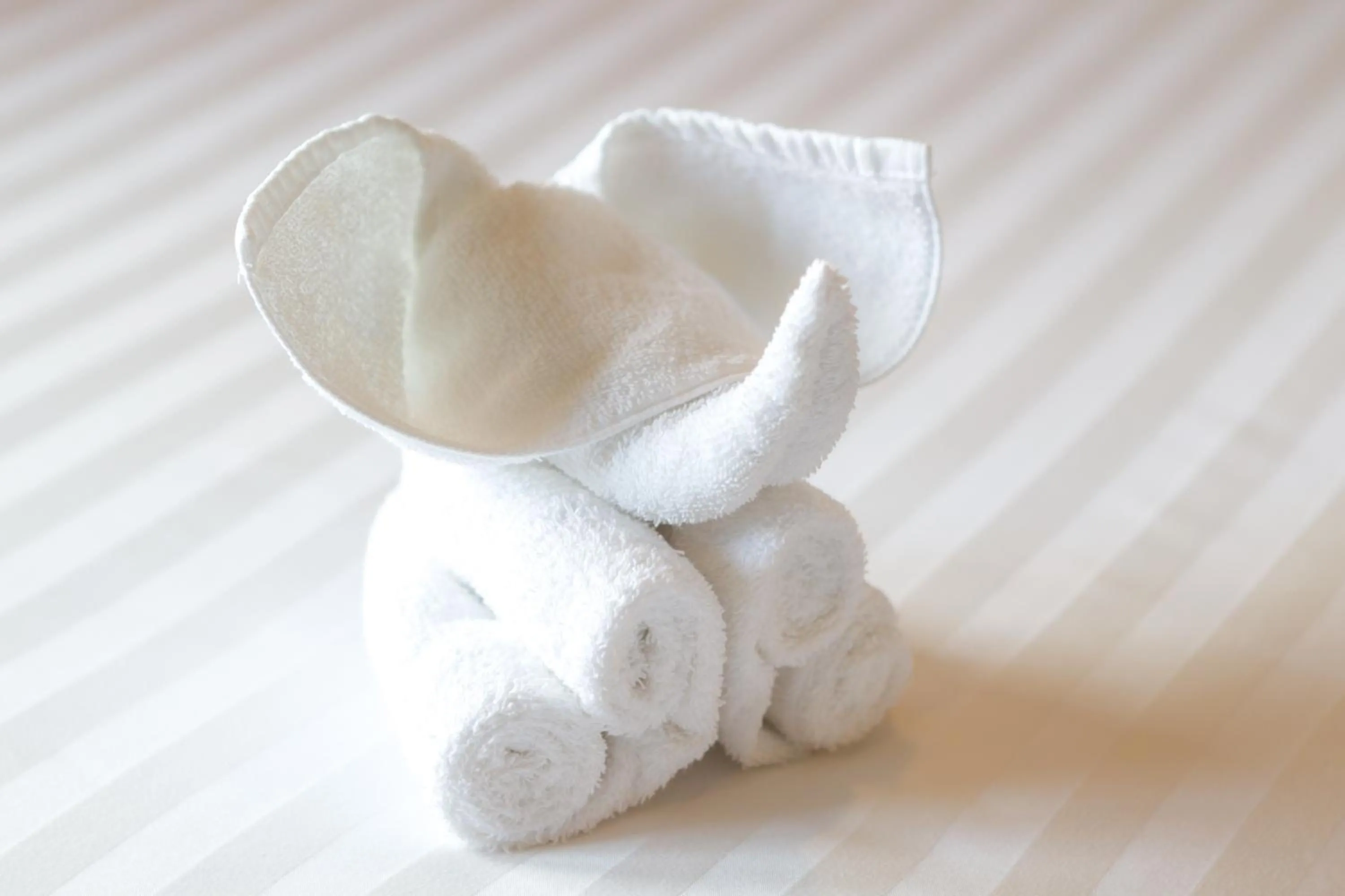 Bedroom in Golden Tulip Essential Pattaya