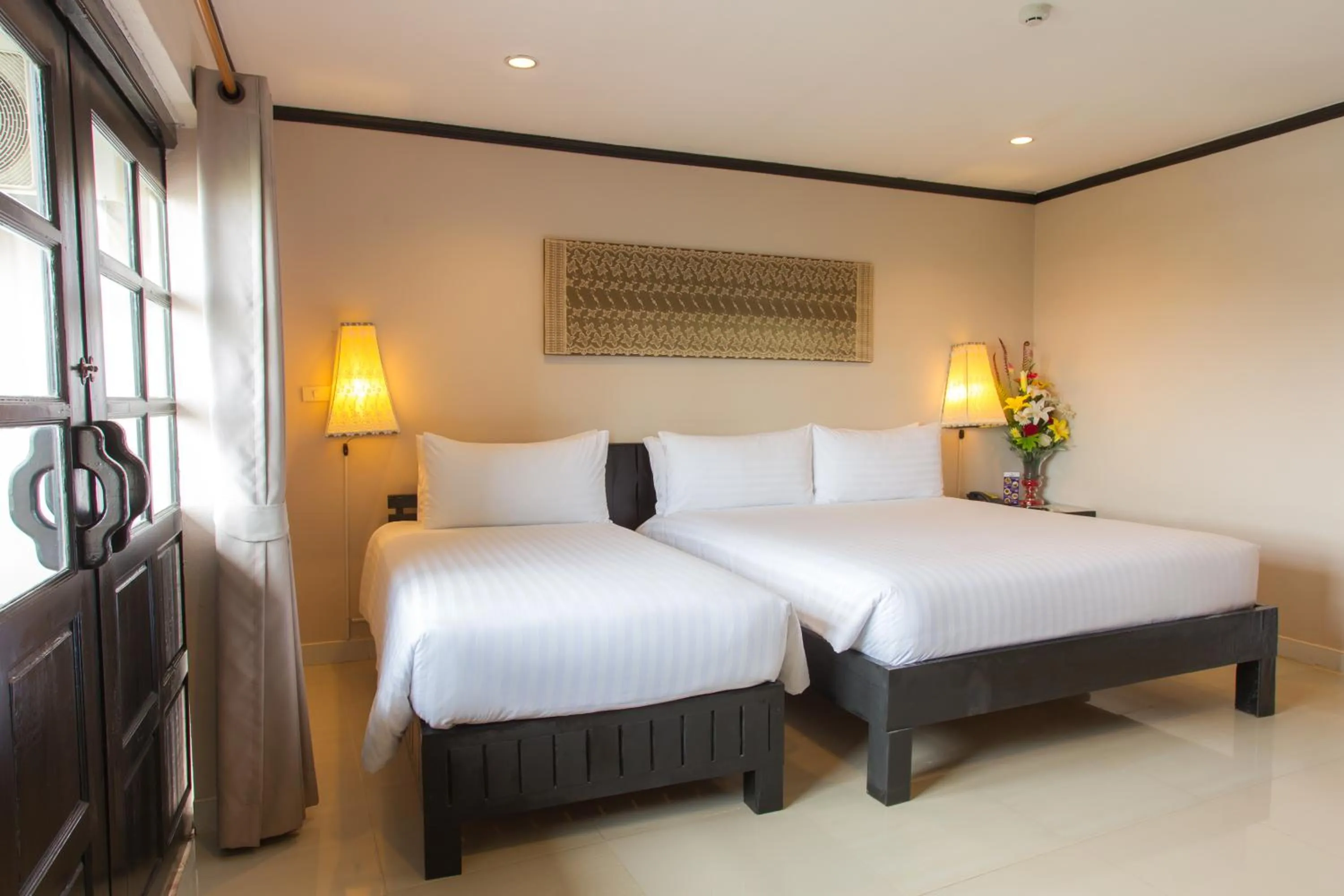 Bedroom in Golden Tulip Essential Pattaya