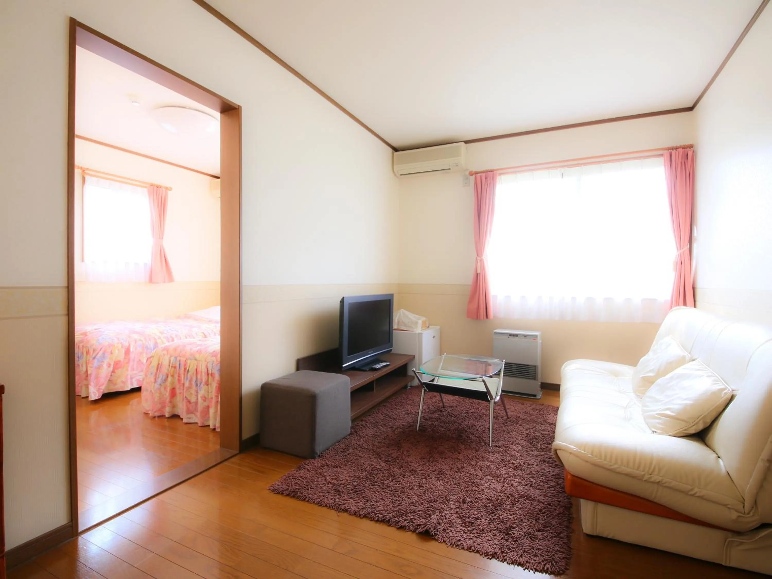 Living room, Bed in Anise Garden