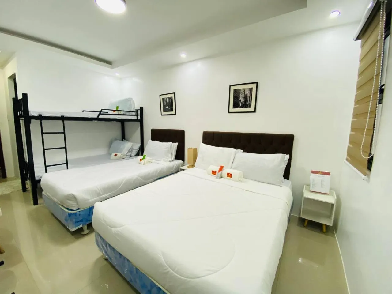 Bed in Marketpoint Hotel