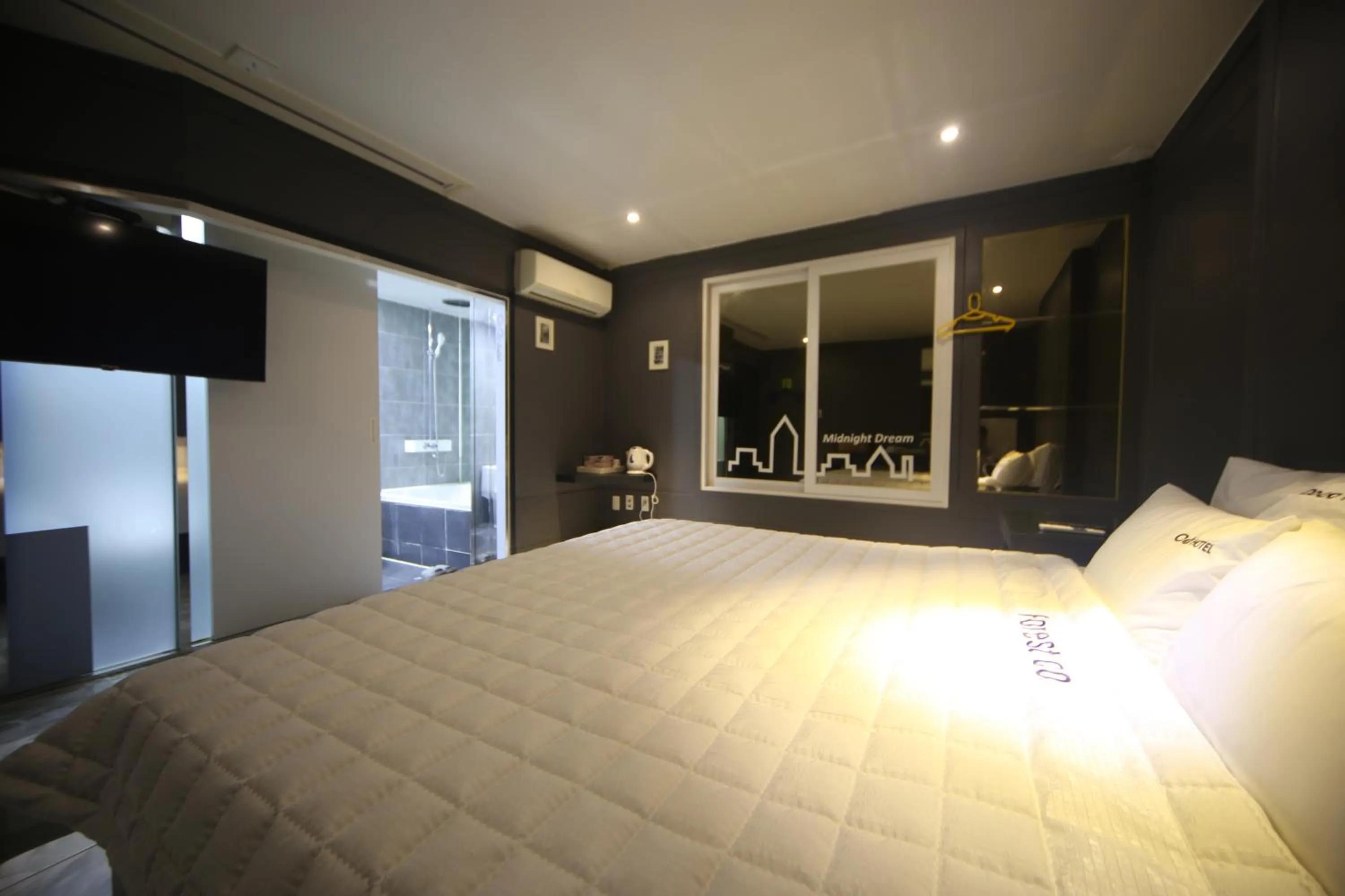 Bed in Songjeong Coco Hotel