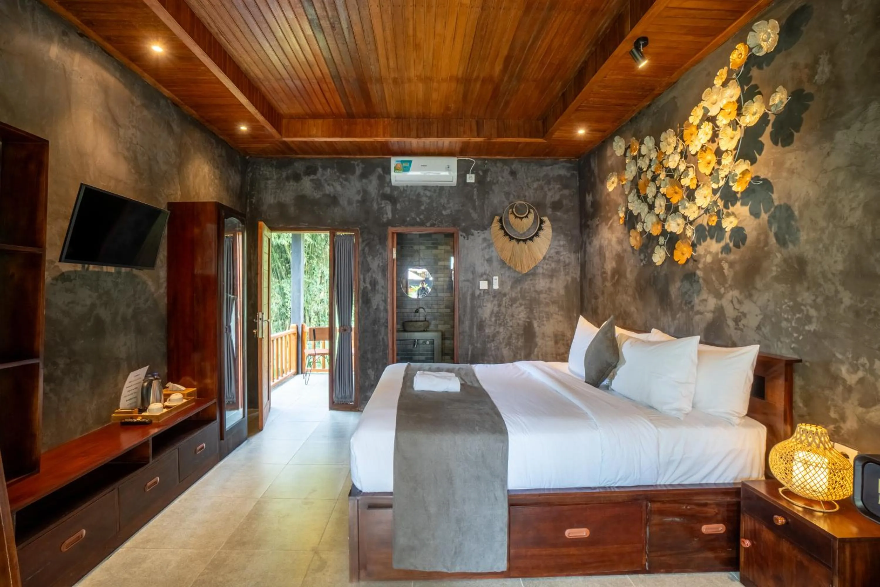 Communal lounge/ TV room, Bed in Puri Kurnia Ayu