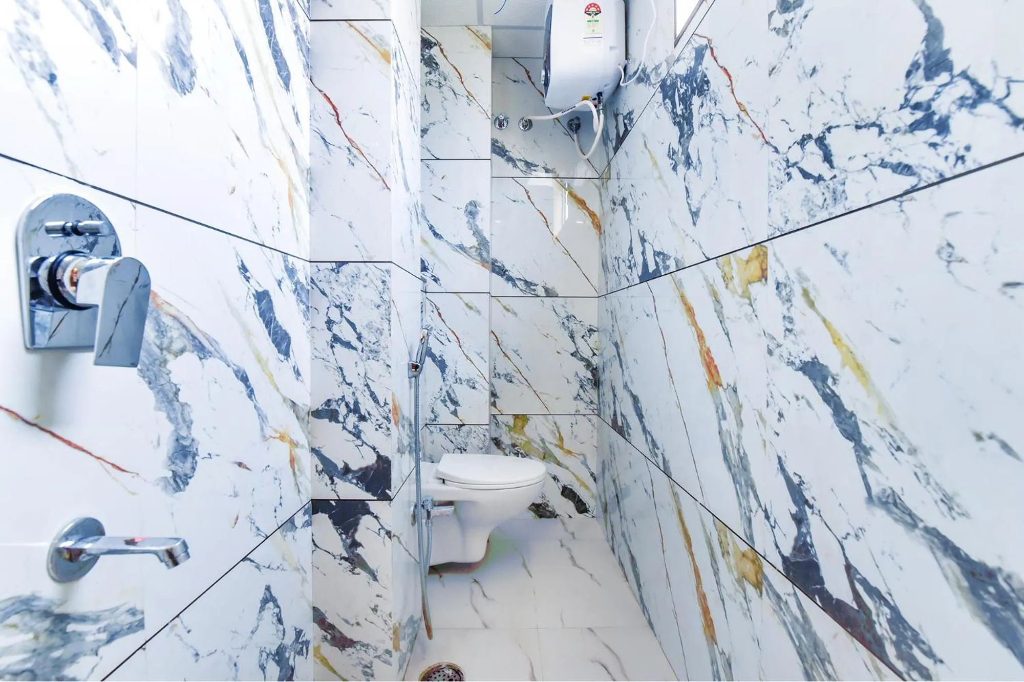 Bathroom in FabHotel Samrat Regency