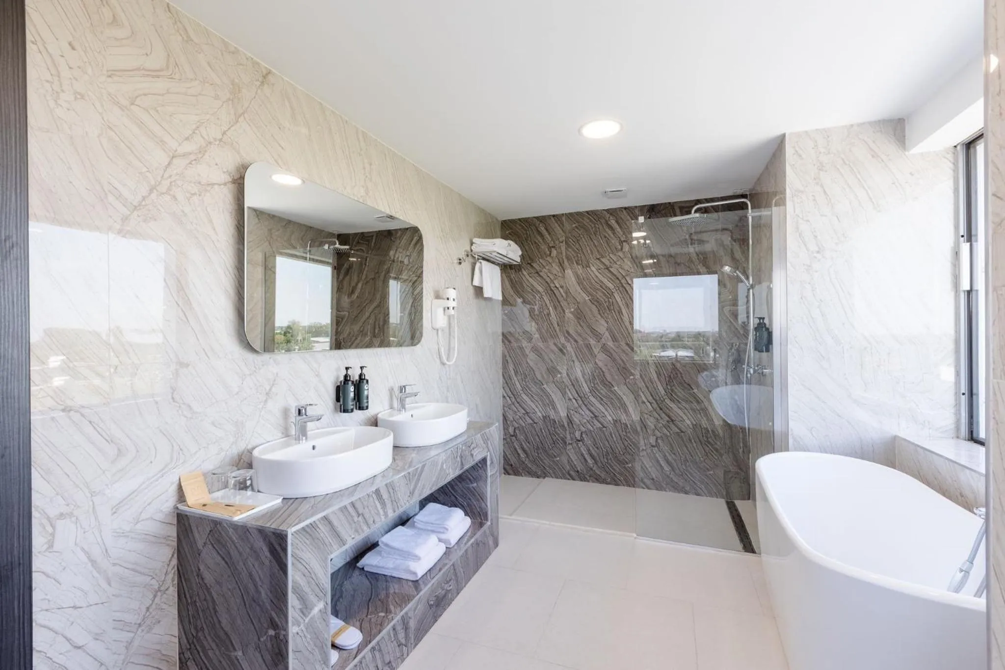 Bathroom in Ramada by Wyndham Bucharest Otopeni Airport