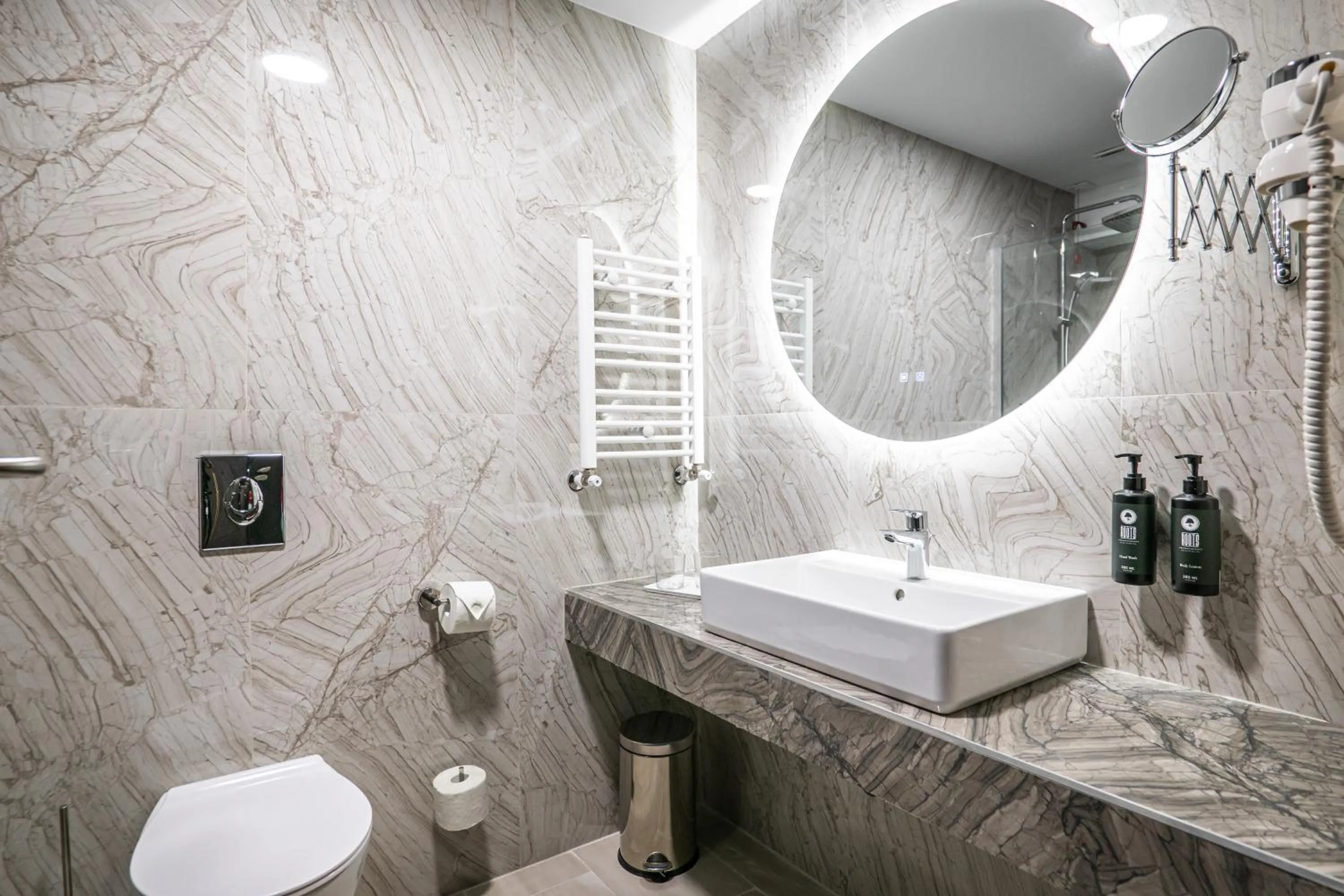 Bathroom in Ramada by Wyndham Bucharest Otopeni Airport
