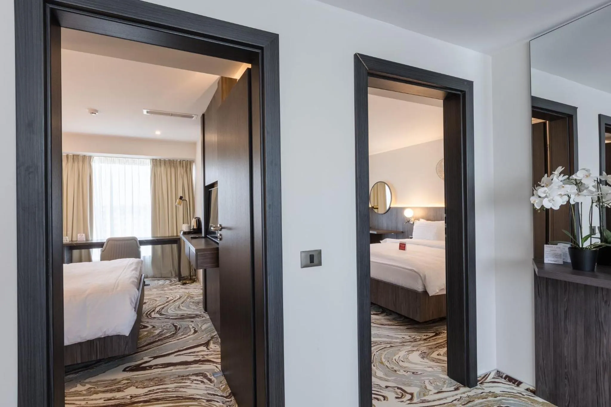 Bed in Ramada by Wyndham Bucharest Otopeni Airport