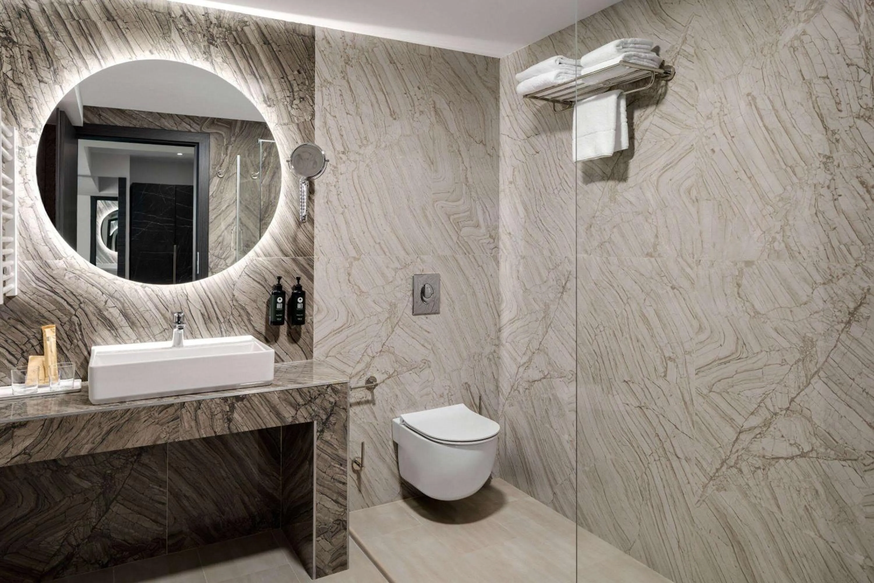 Bathroom in Ramada by Wyndham Bucharest Otopeni Airport
