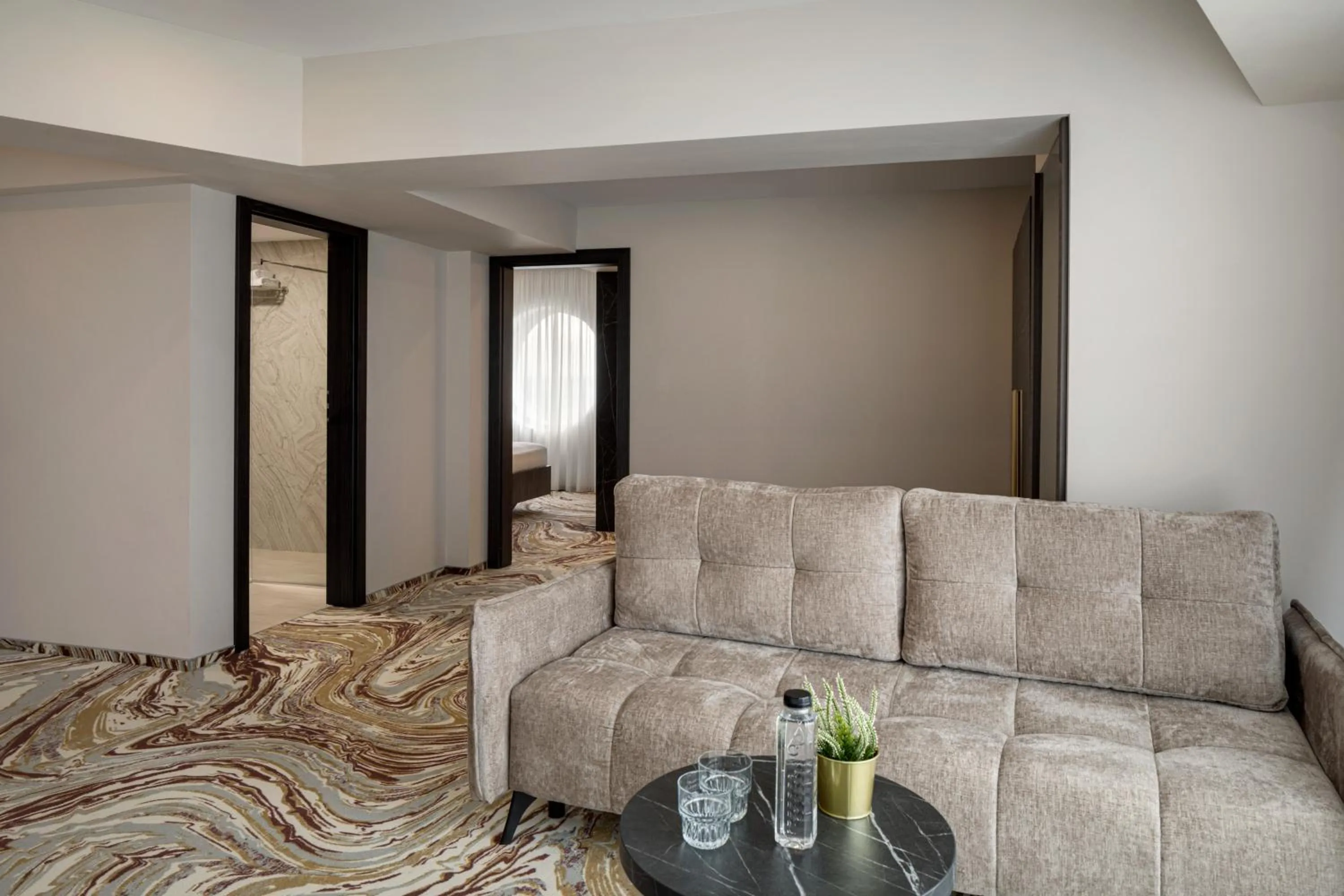 Living room in Ramada by Wyndham Bucharest Otopeni Airport
