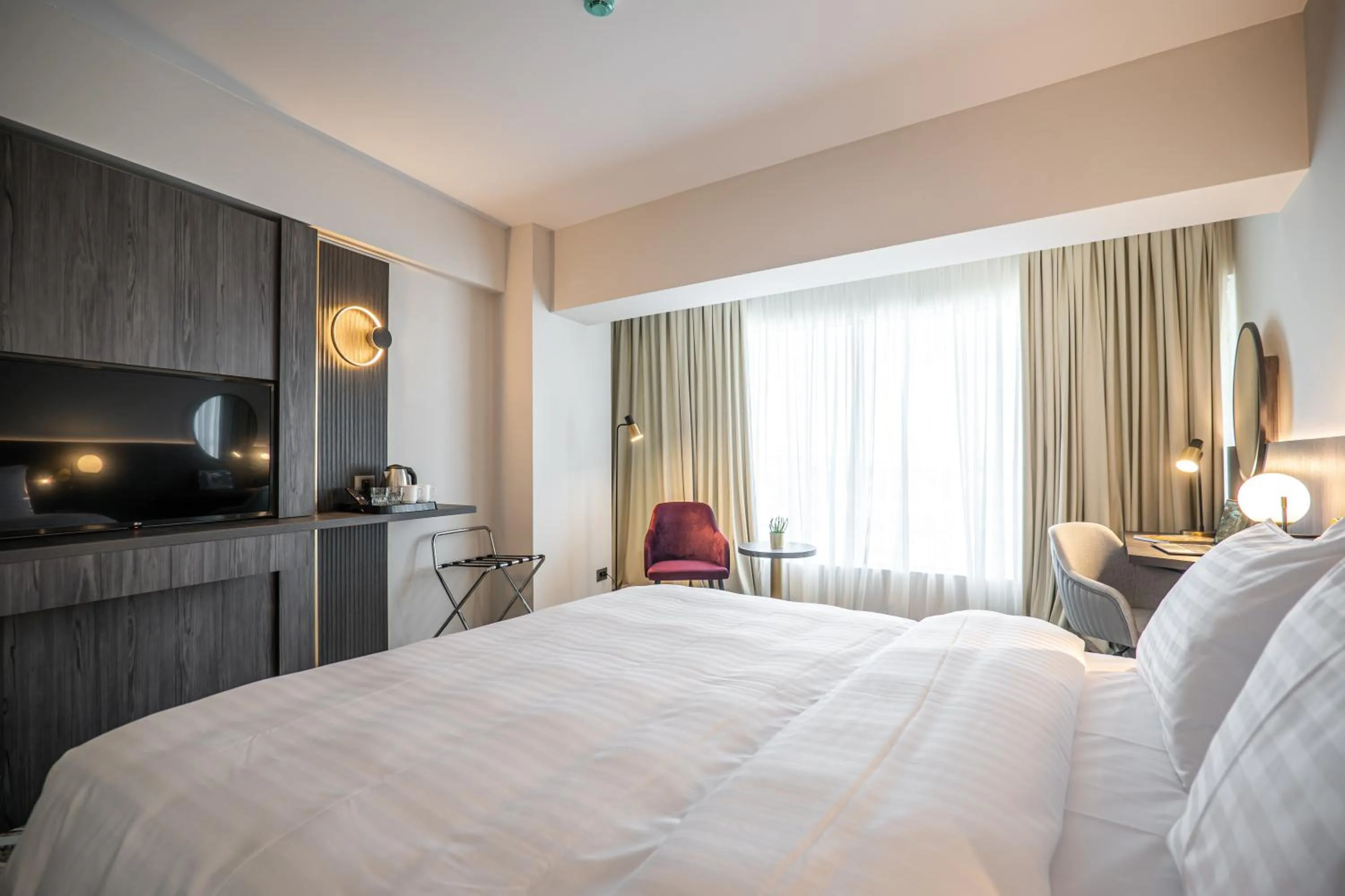 Bed in Ramada by Wyndham Bucharest Otopeni Airport