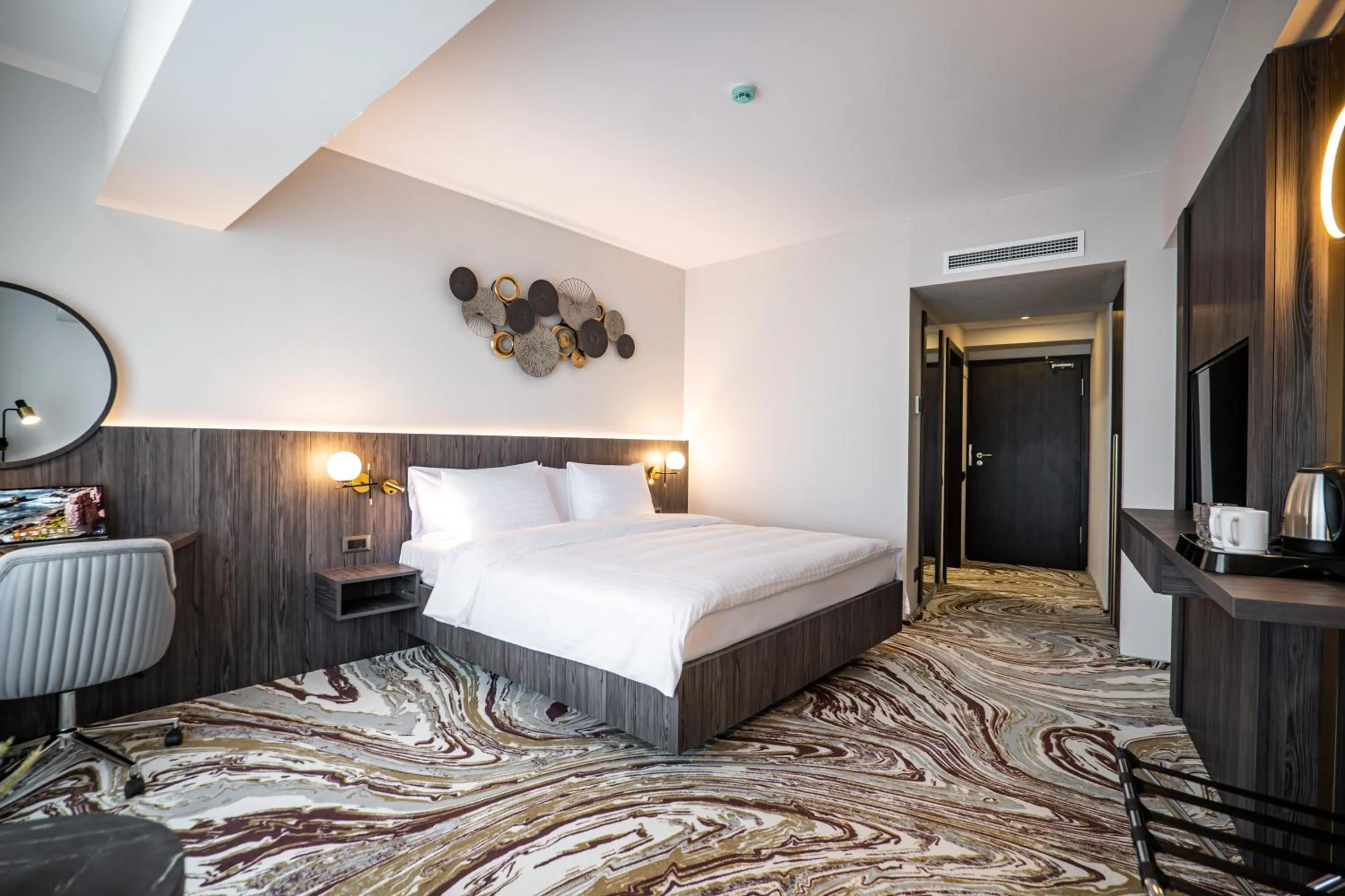 Bed in Ramada by Wyndham Bucharest Otopeni Airport