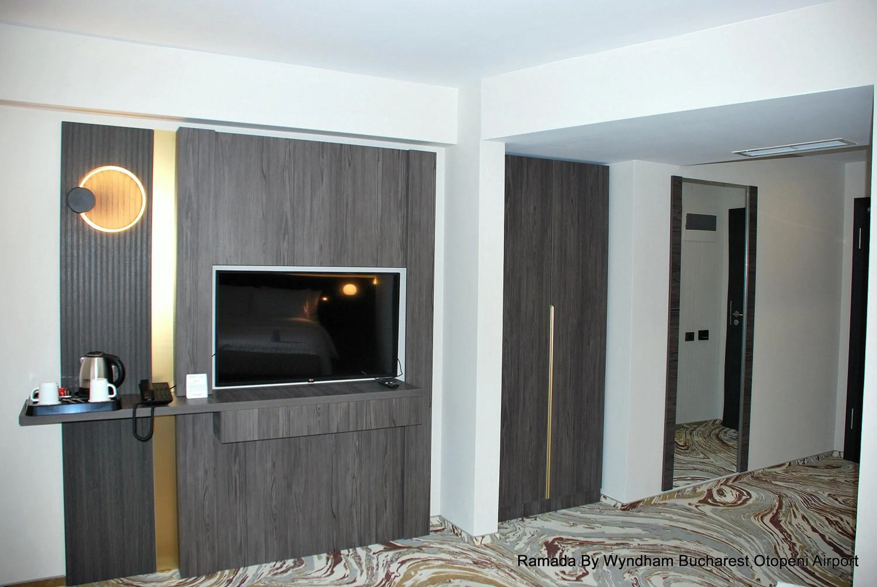 TV and multimedia in Ramada by Wyndham Bucharest Otopeni Airport