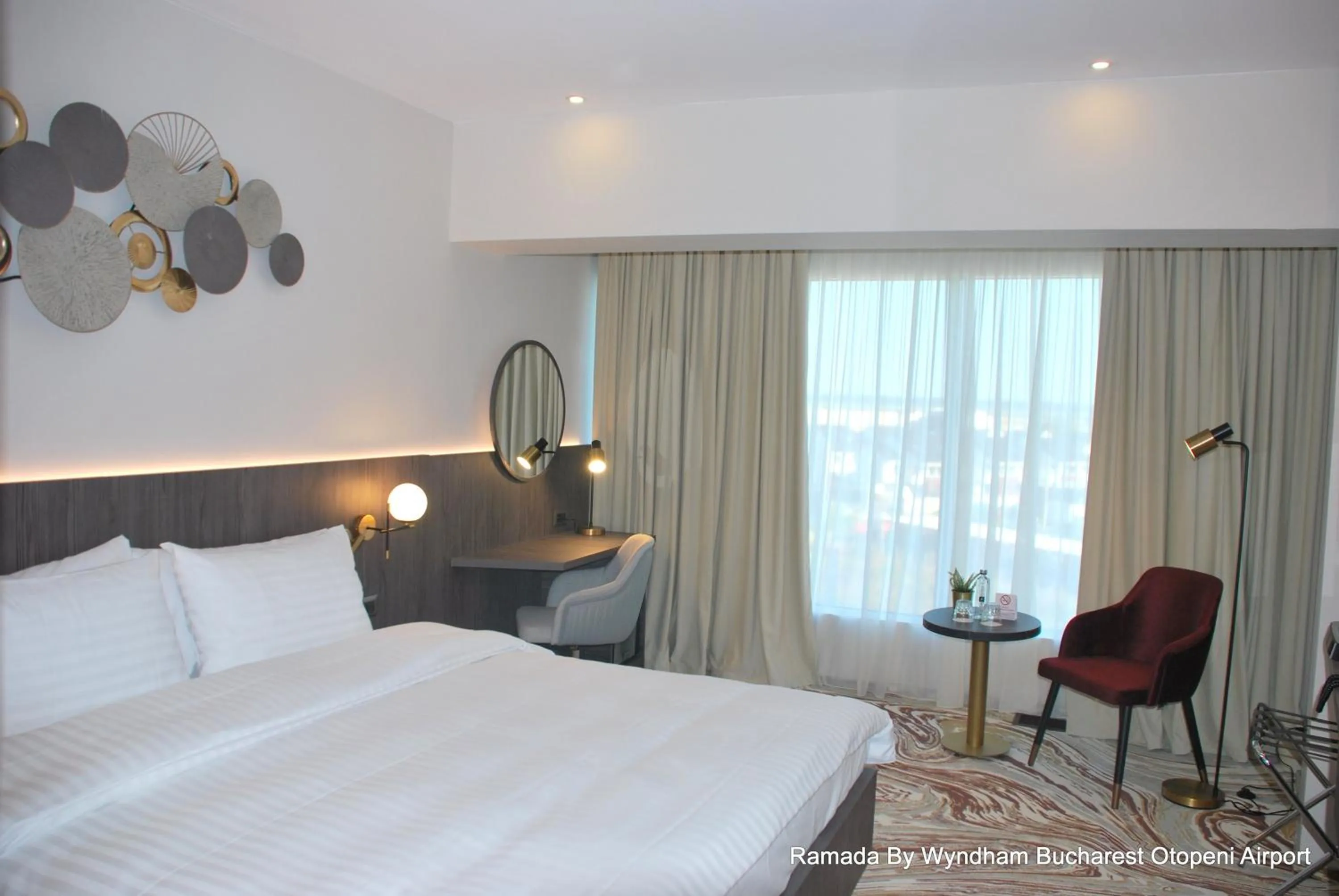 Bed in Ramada by Wyndham Bucharest Otopeni Airport