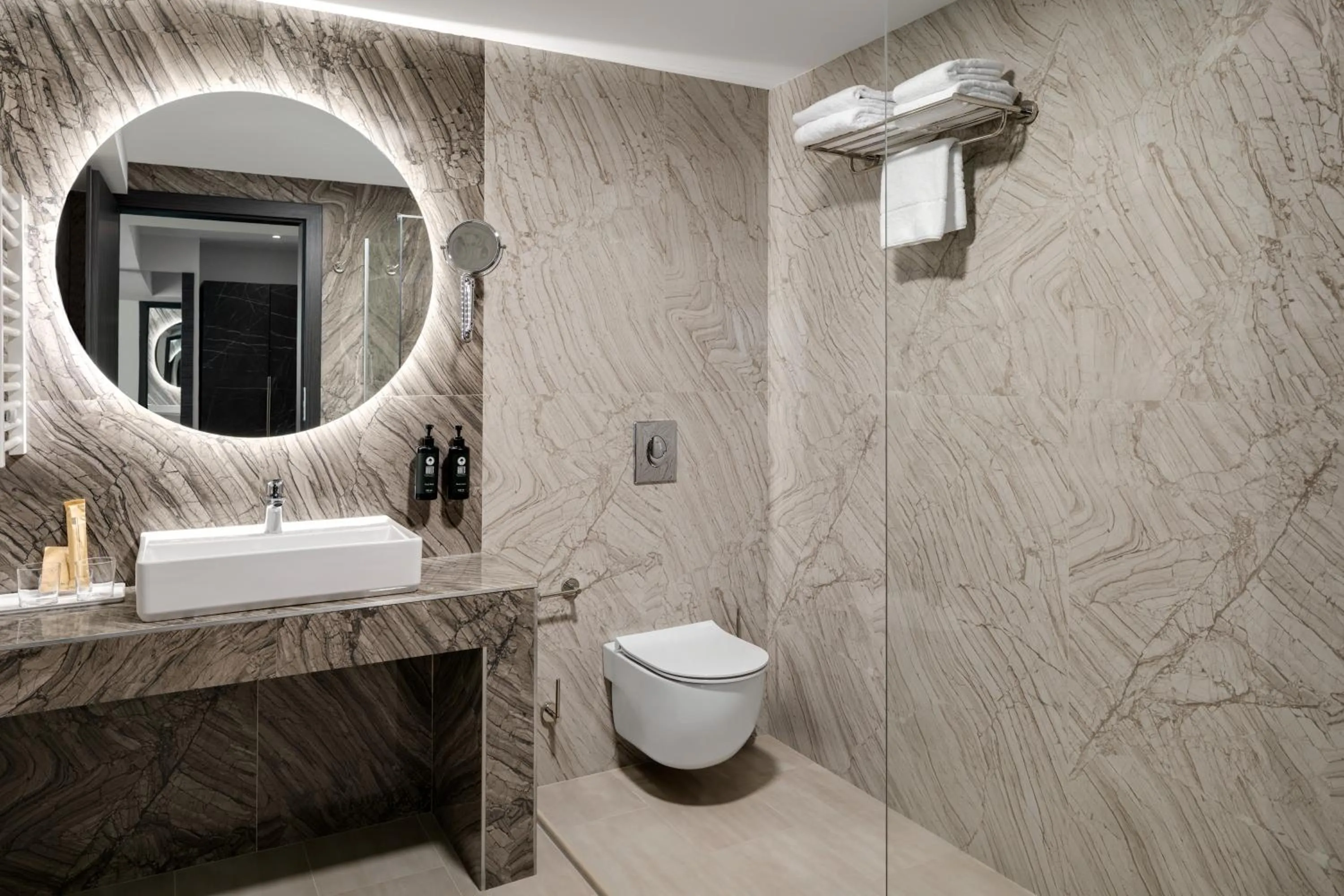 Bathroom in Ramada by Wyndham Bucharest Otopeni Airport