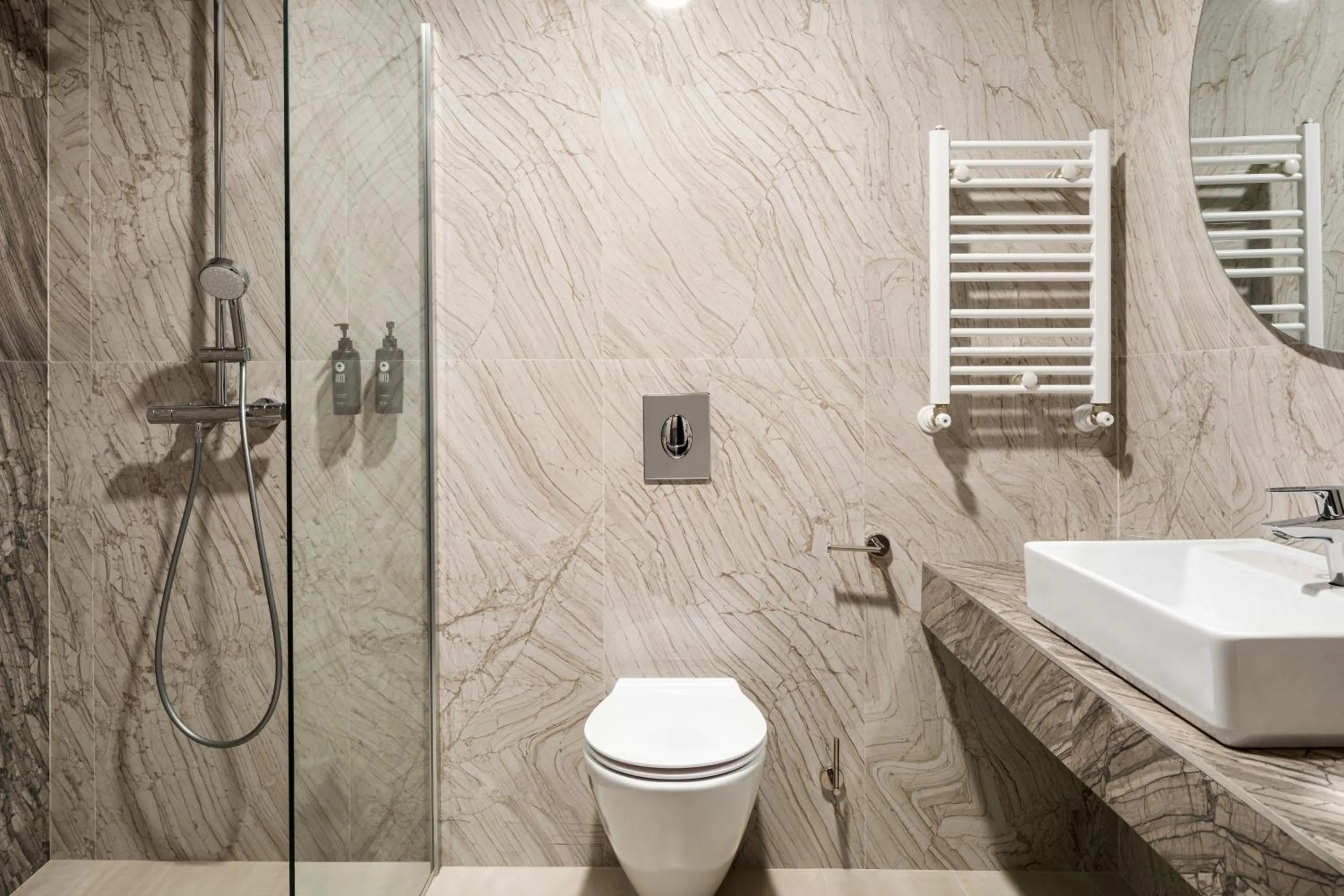 Bathroom in Ramada by Wyndham Bucharest Otopeni Airport