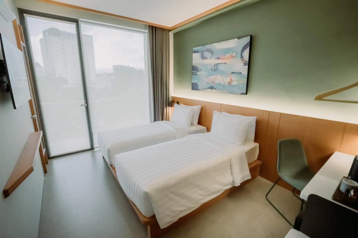 Bed in Jiro Hotel