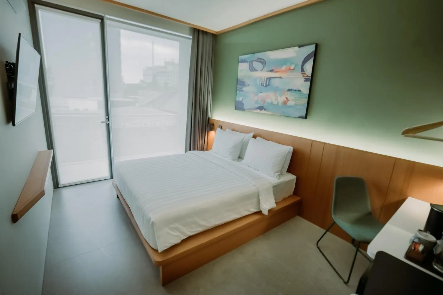 Bed in Jiro Hotel