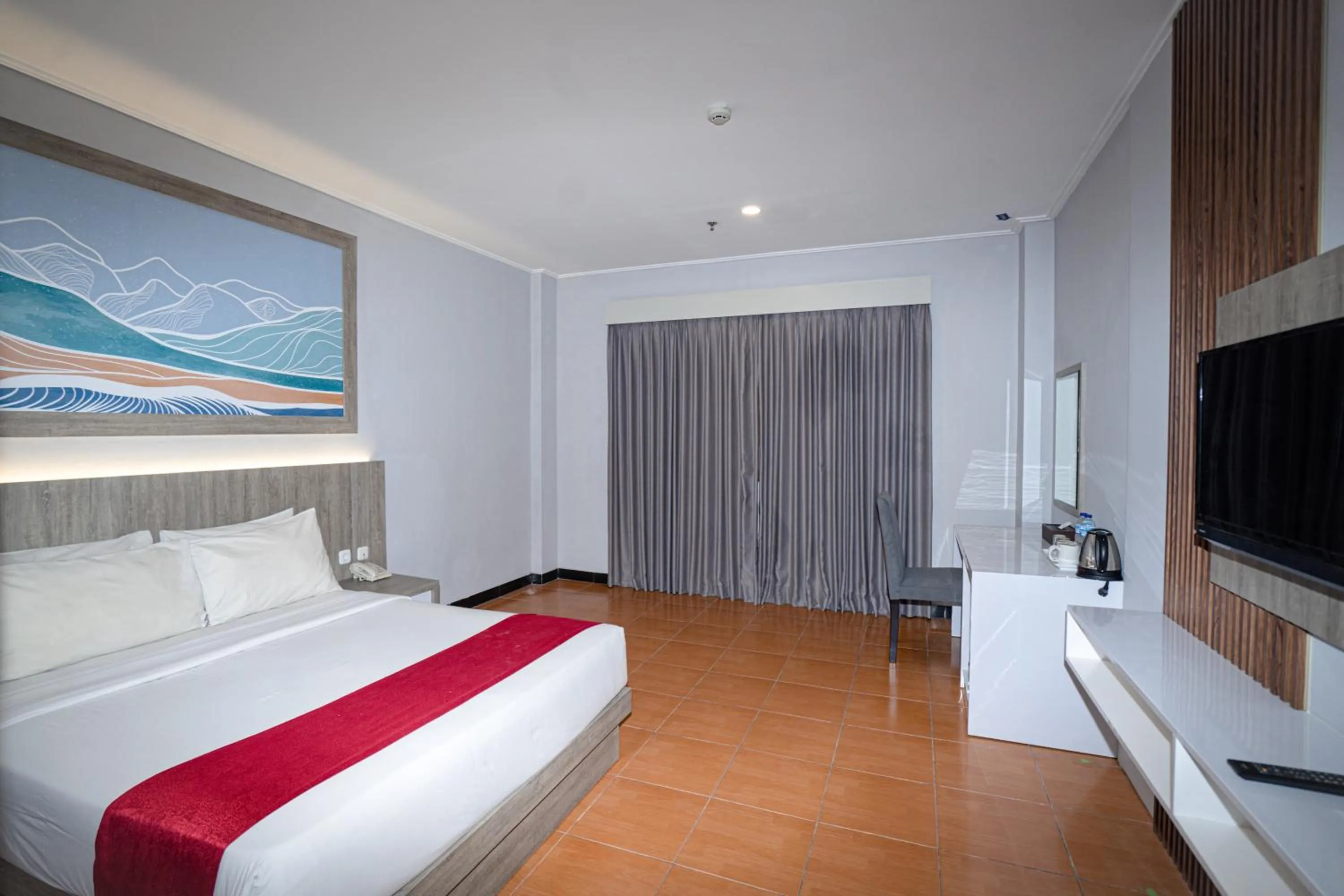 Communal lounge/ TV room, Bed in Front One HK Resort Simpang Lima