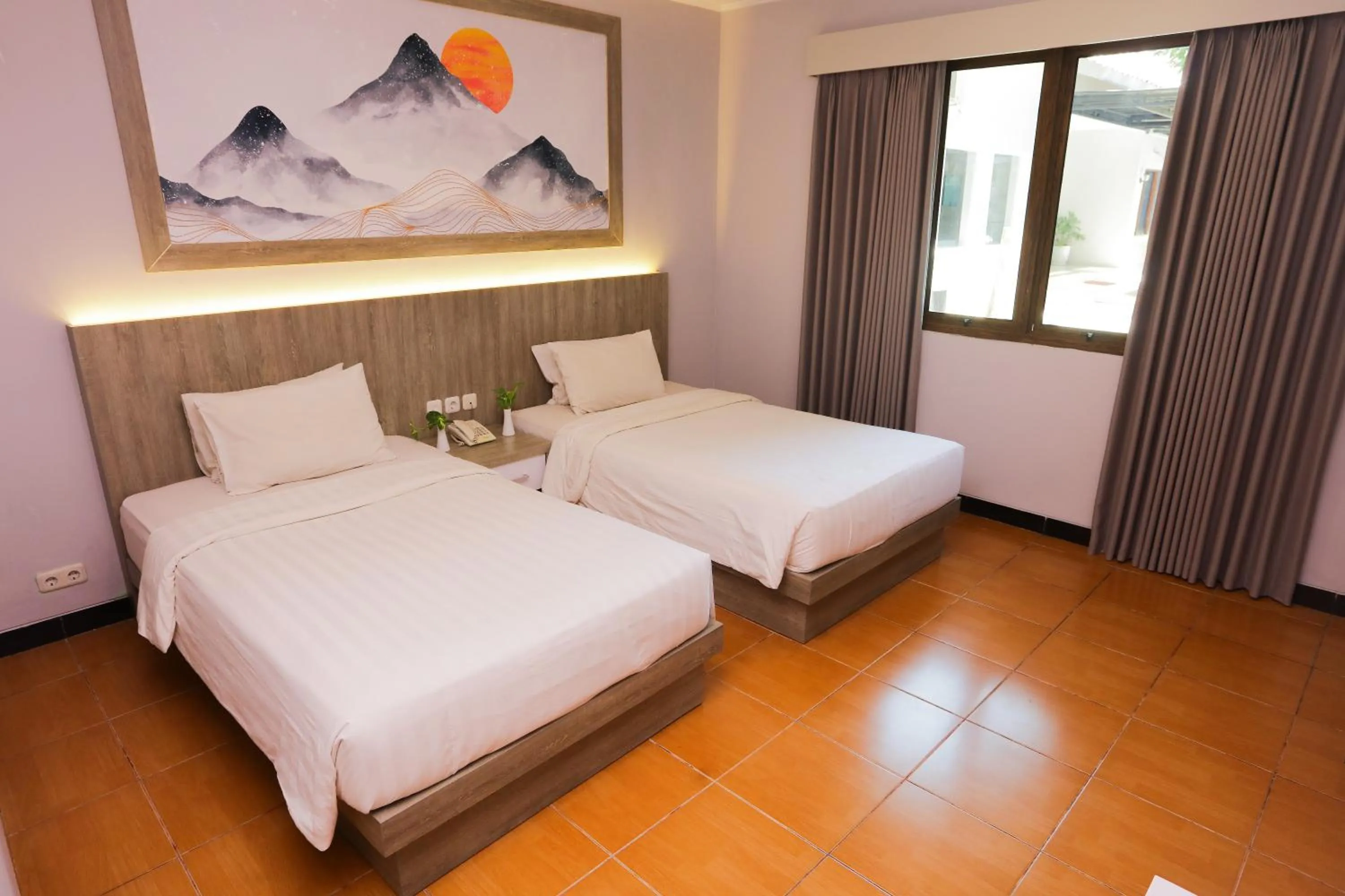 Bed in Front One HK Resort Simpang Lima