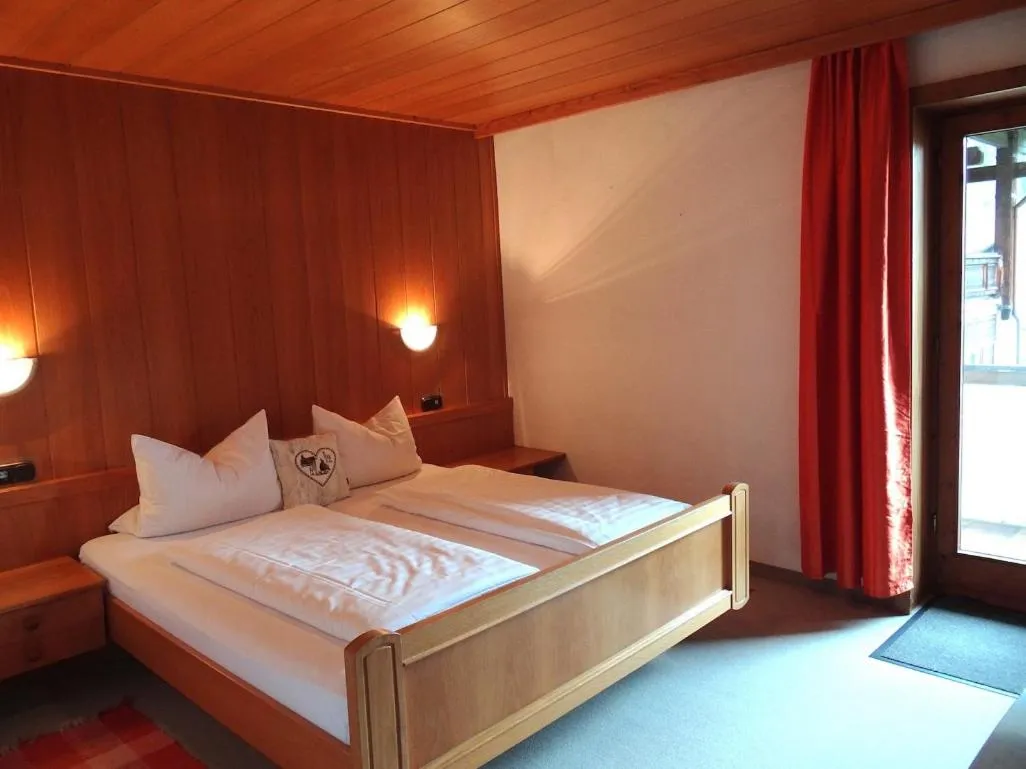 Bed in Alpenhotel Waidmannsheil